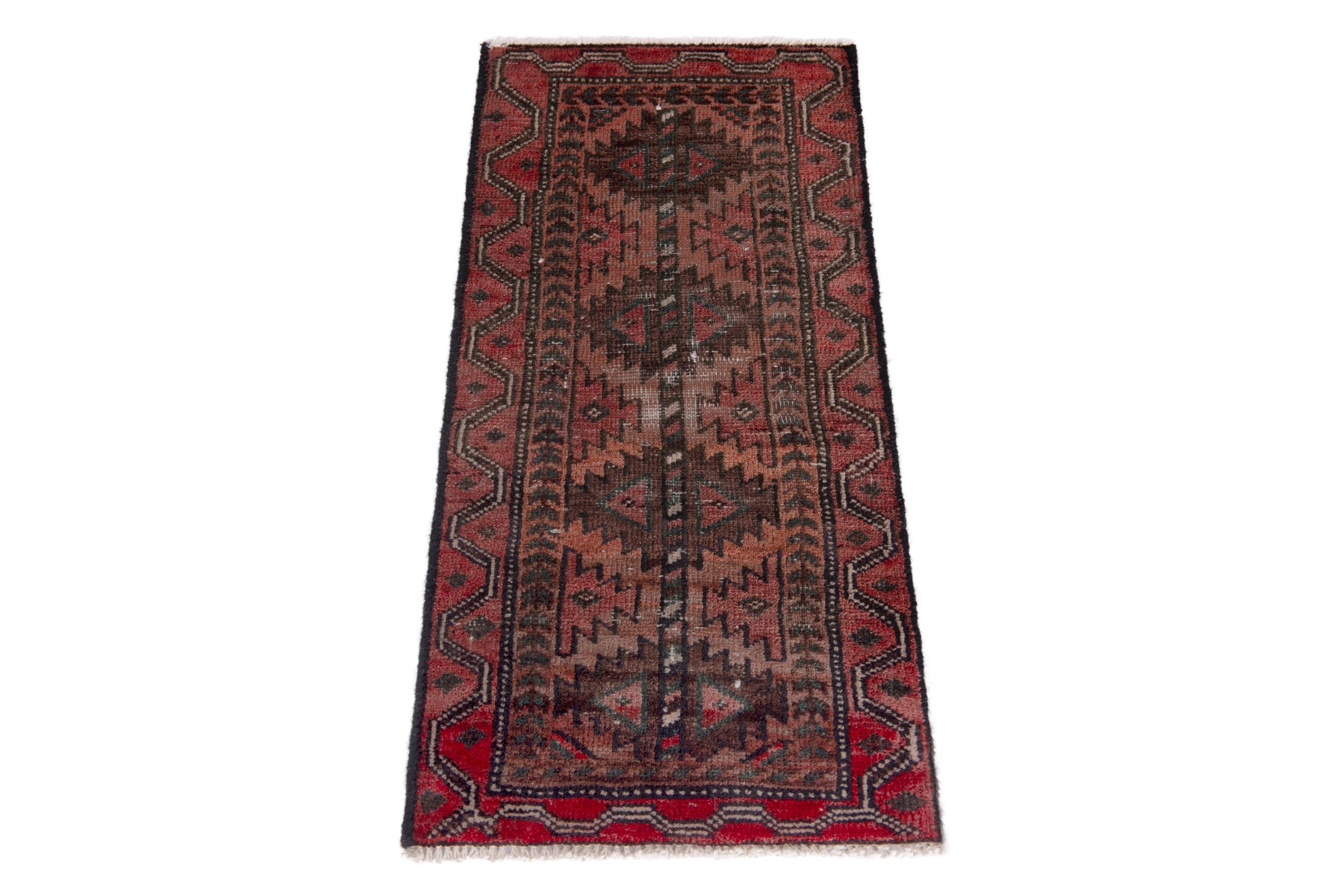 Persian Baluch accent rug in faded red and burgundy, view 2 of 7