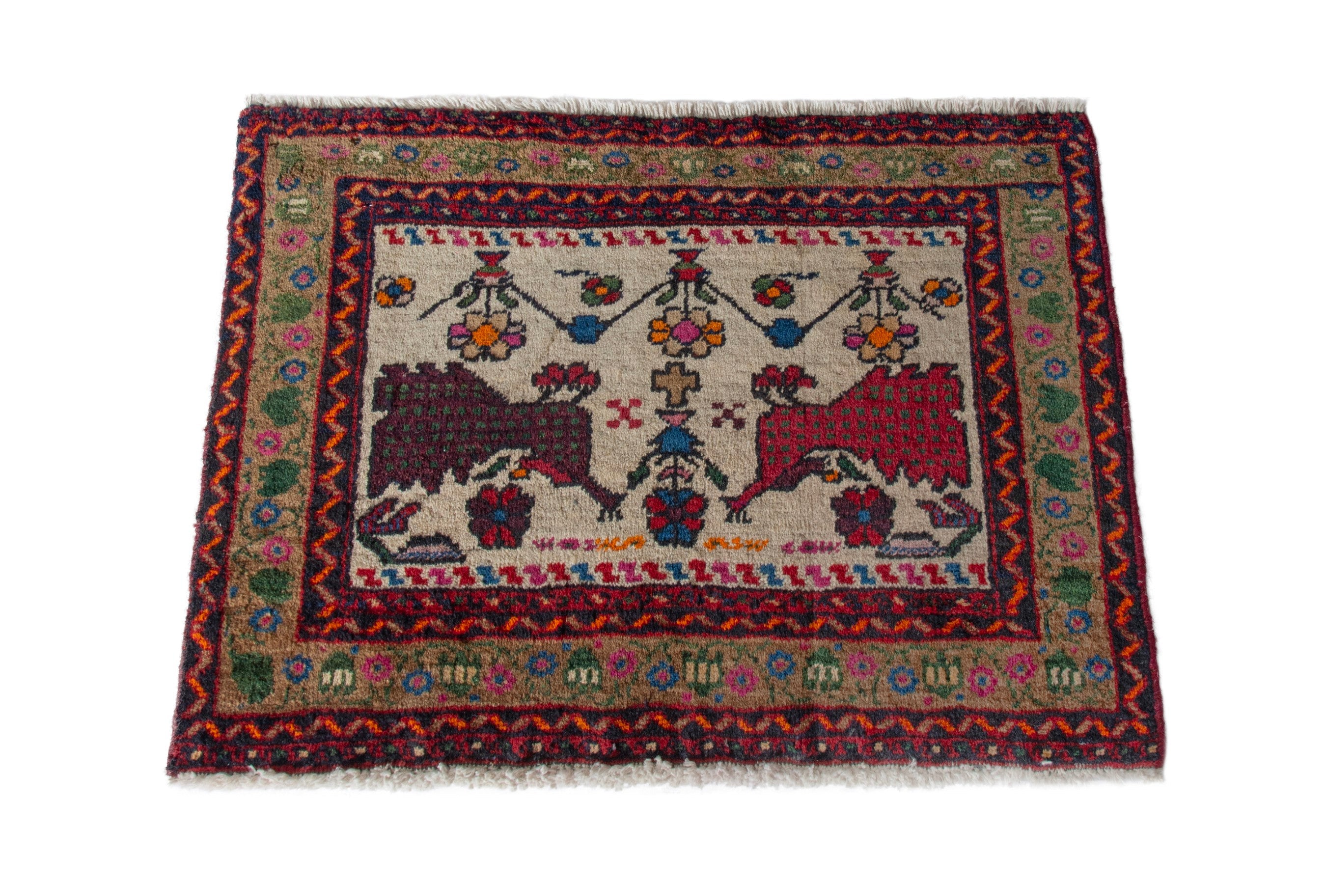 Persian Baluch accent rug in deep red and cream, view 2 of 8