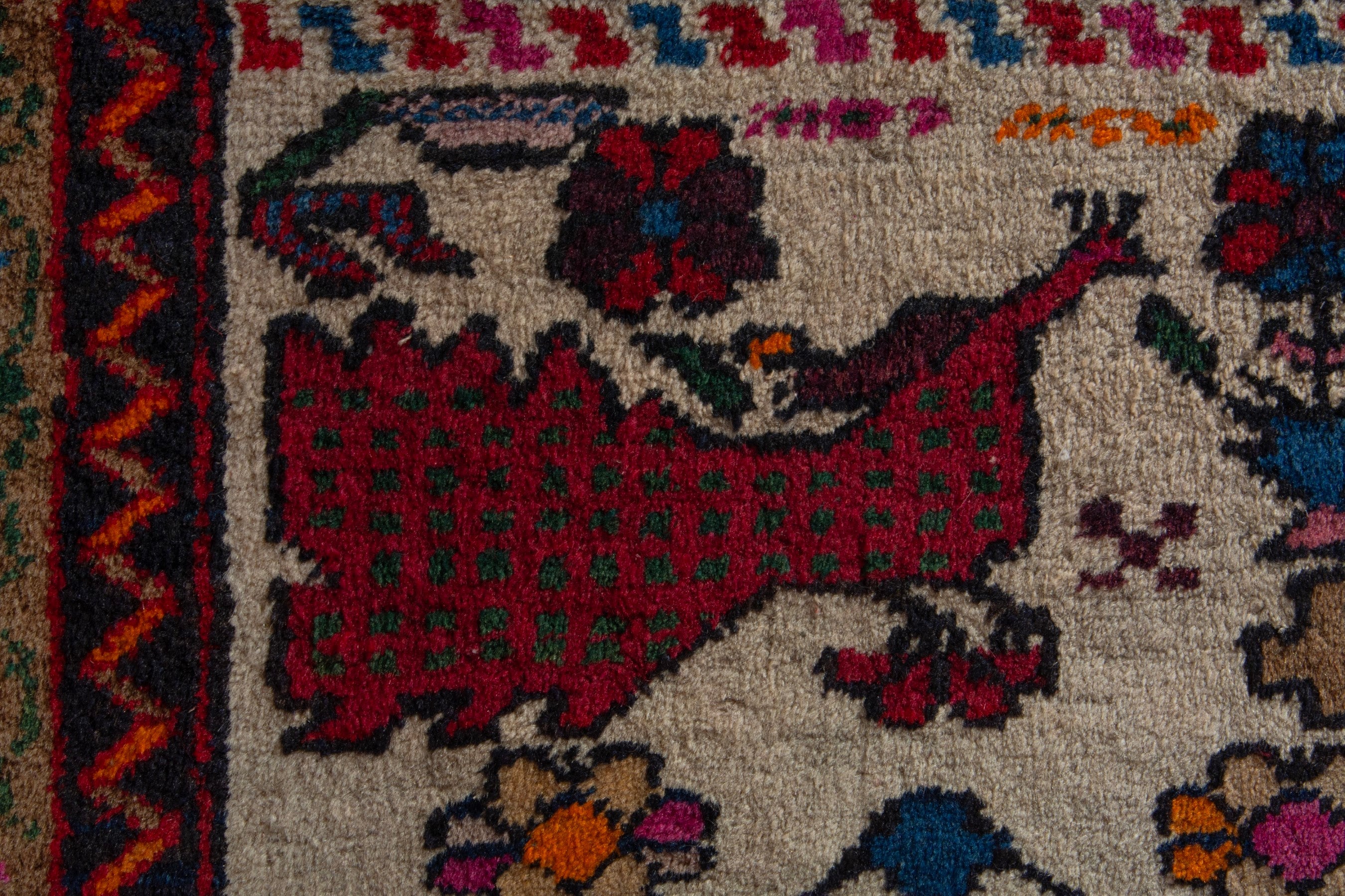 Persian Baluch accent rug in deep red and cream, view 6 of 8