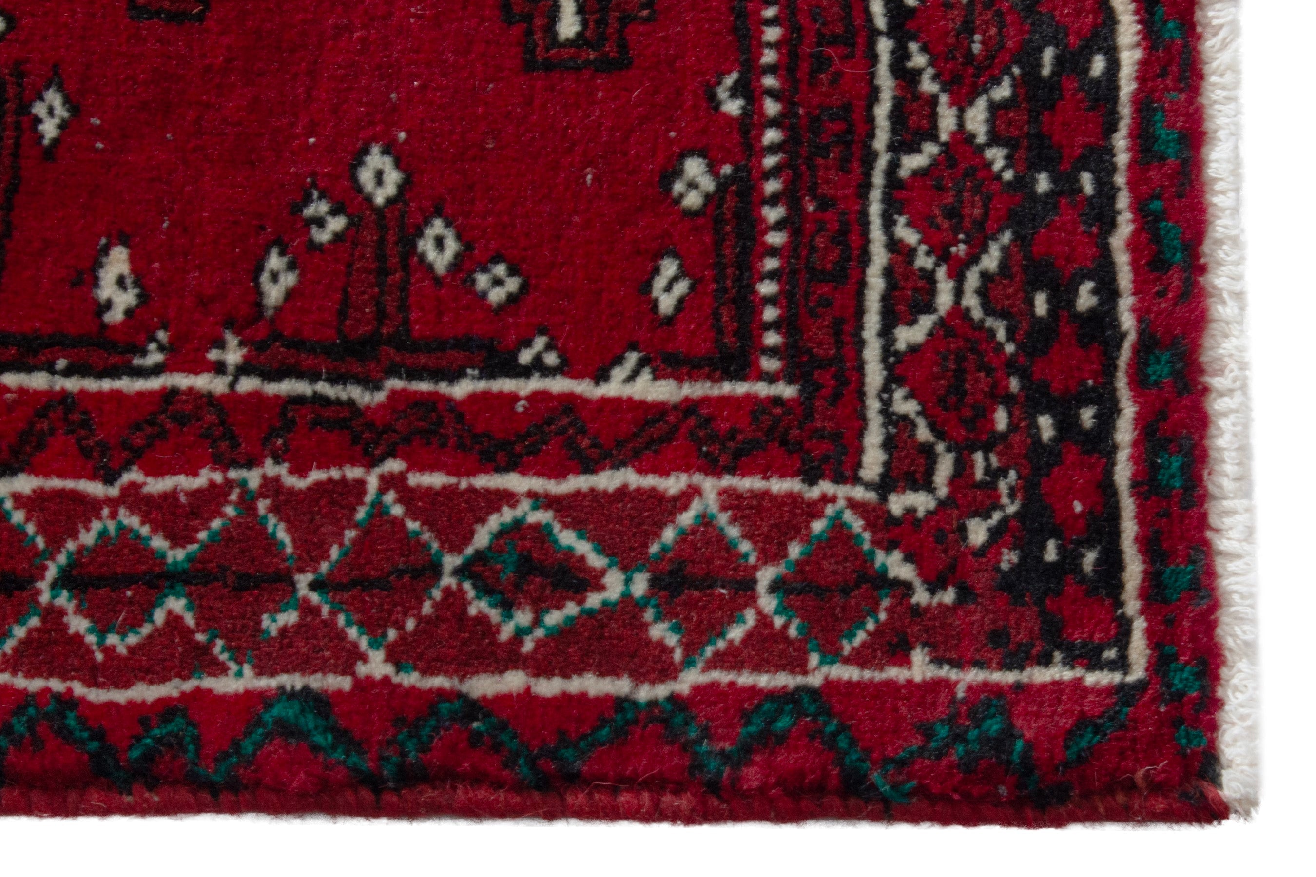 Persian Torkaman accent rug in deep red and burgundy, view 4 of 8
