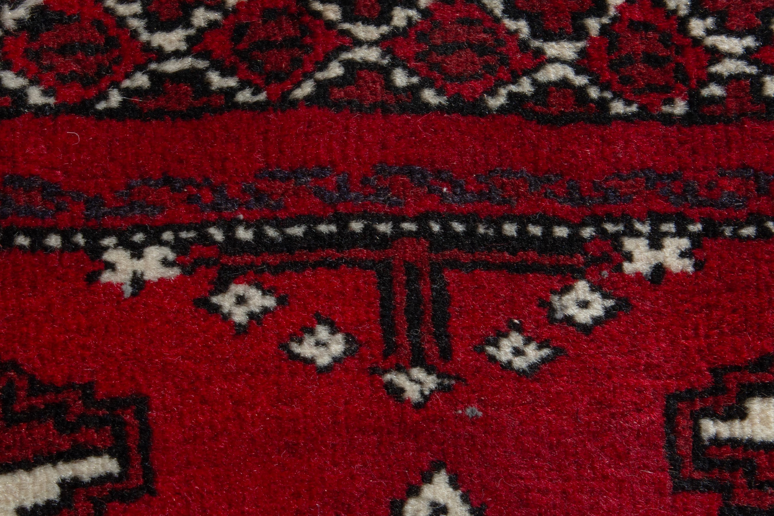 Persian Torkaman accent rug in deep red and burgundy, view 7 of 8