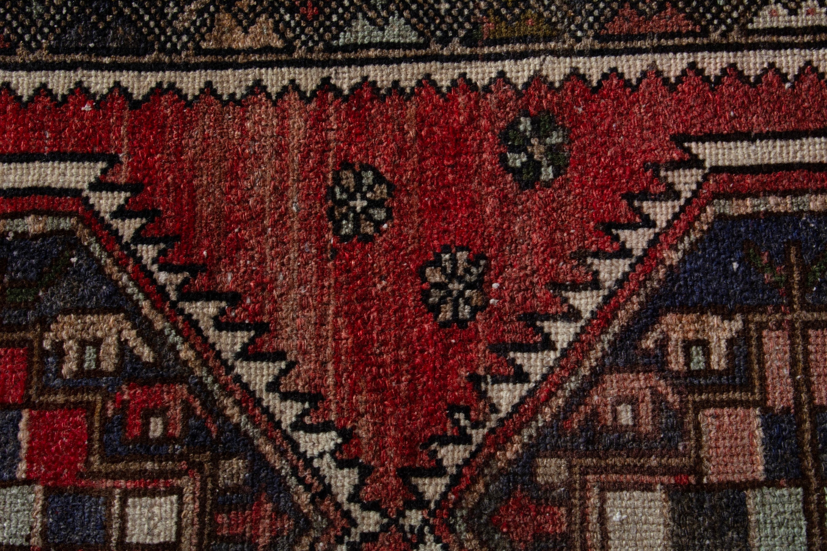 Persian Zanjan accent rug in deep red and charcoal, view 5 of 7