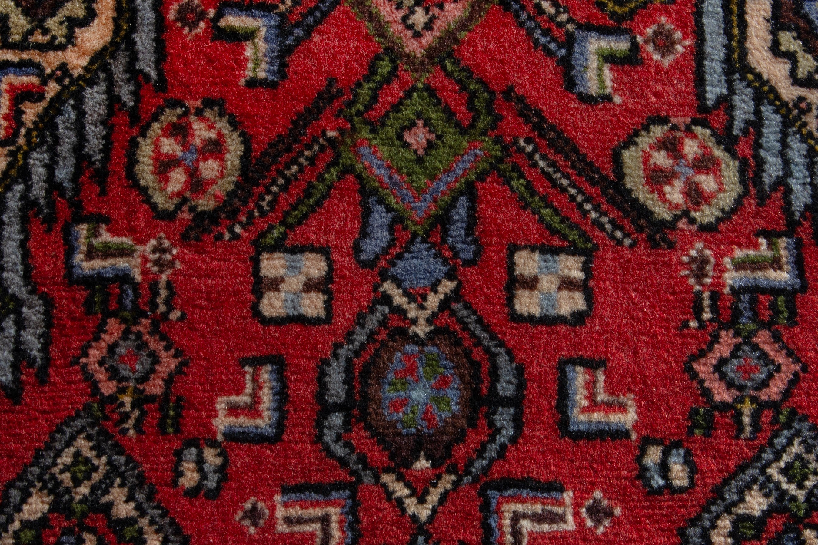 Persian Hamedan accent rug in deep red and navy, view 7 of 8