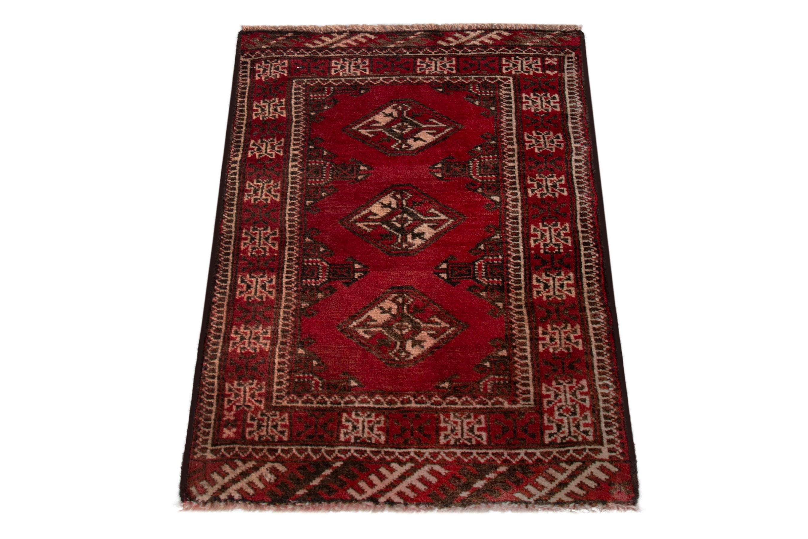 Persian Torkaman accent rug in deep red and cream, view 3 of 8
