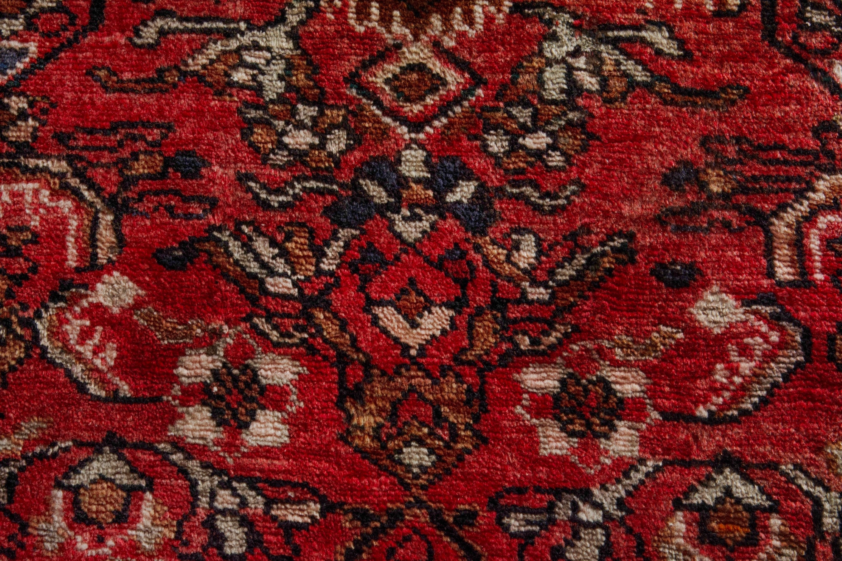 Persian Lilihan accent rug in deep red and terracotta, view 7 of 8