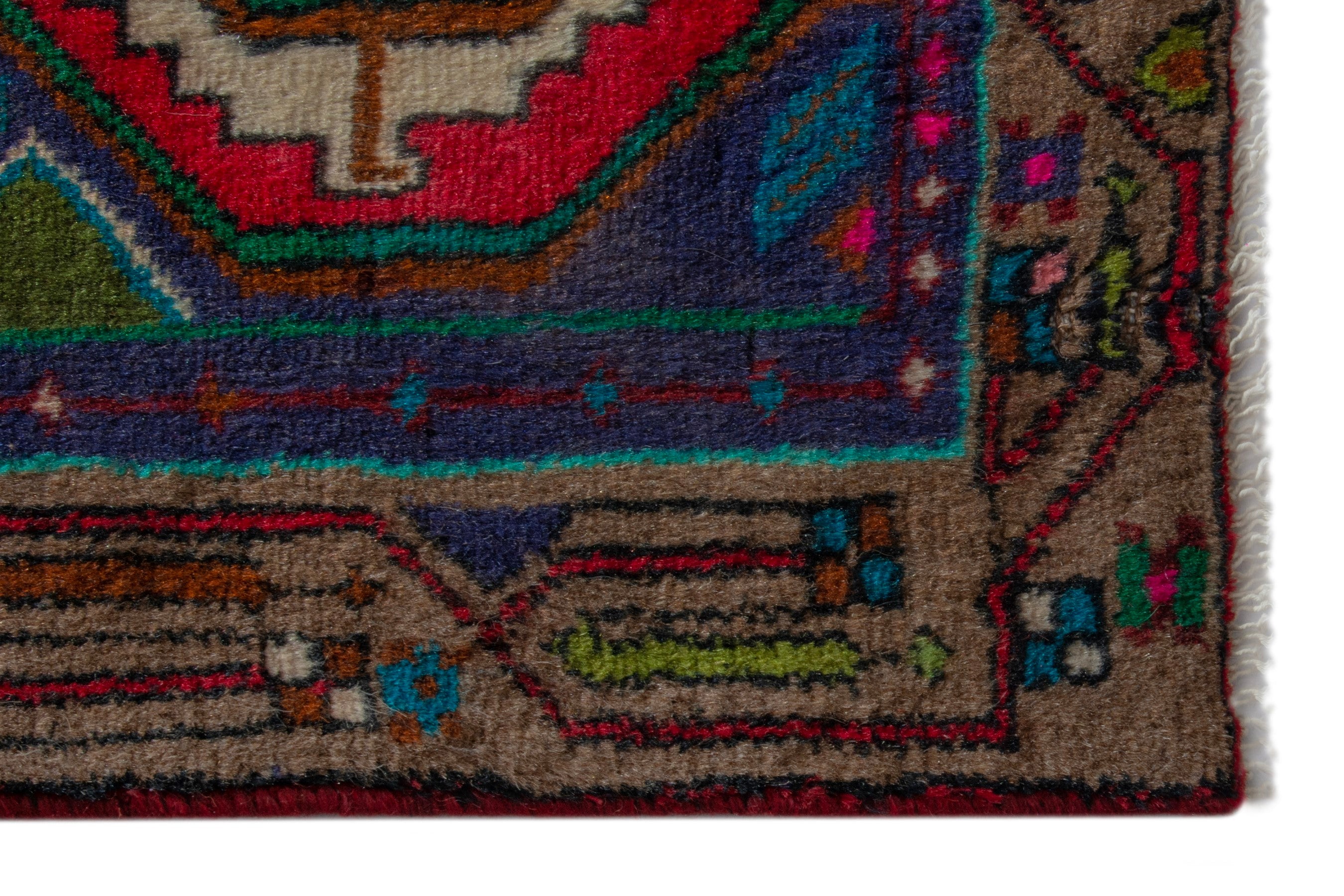 Persian Songhor accent rug in dark blue and deep red, view 4 of 8