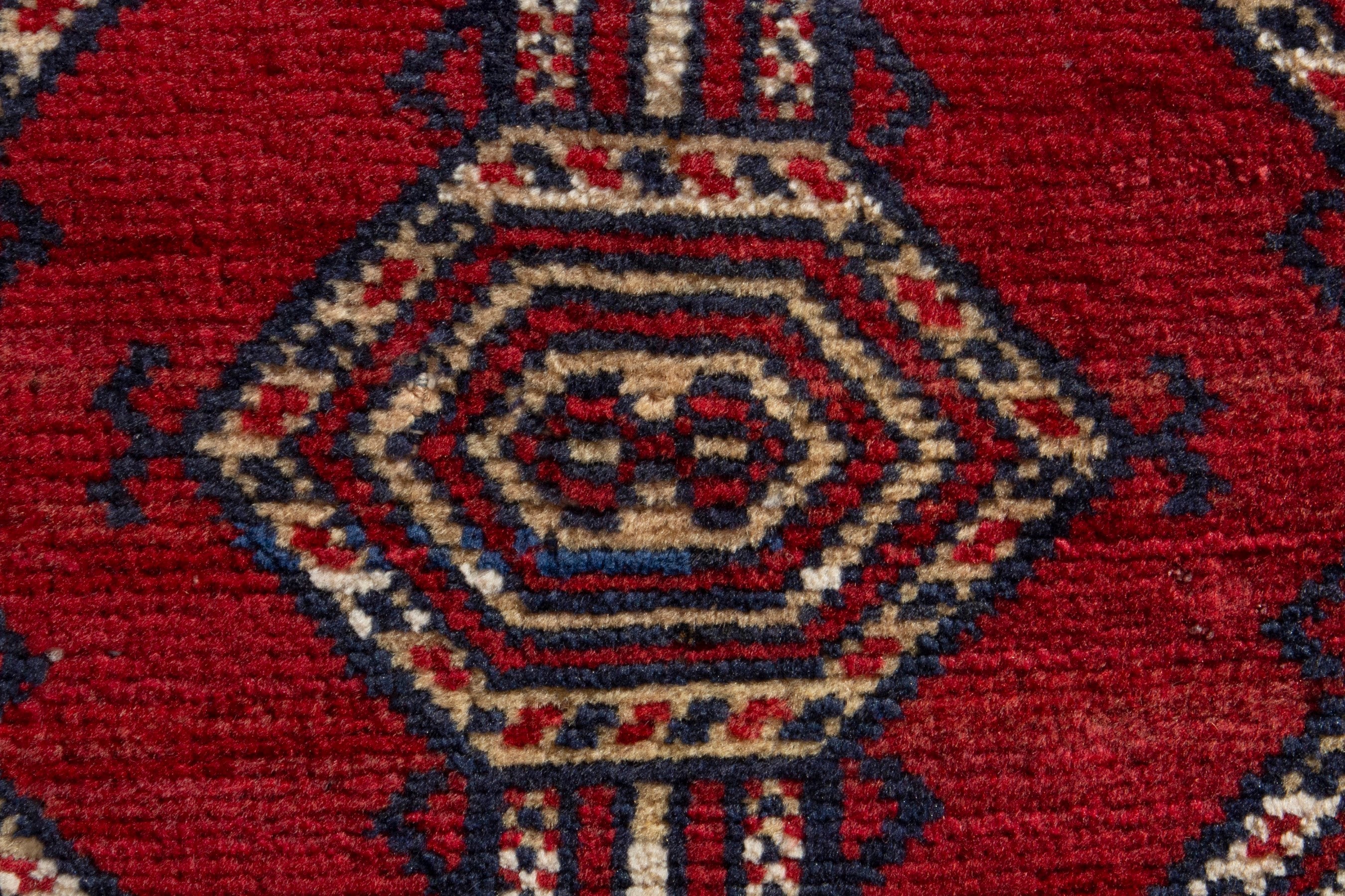 Persian Torkaman accent rug in deep red and burgundy, view 6 of 8