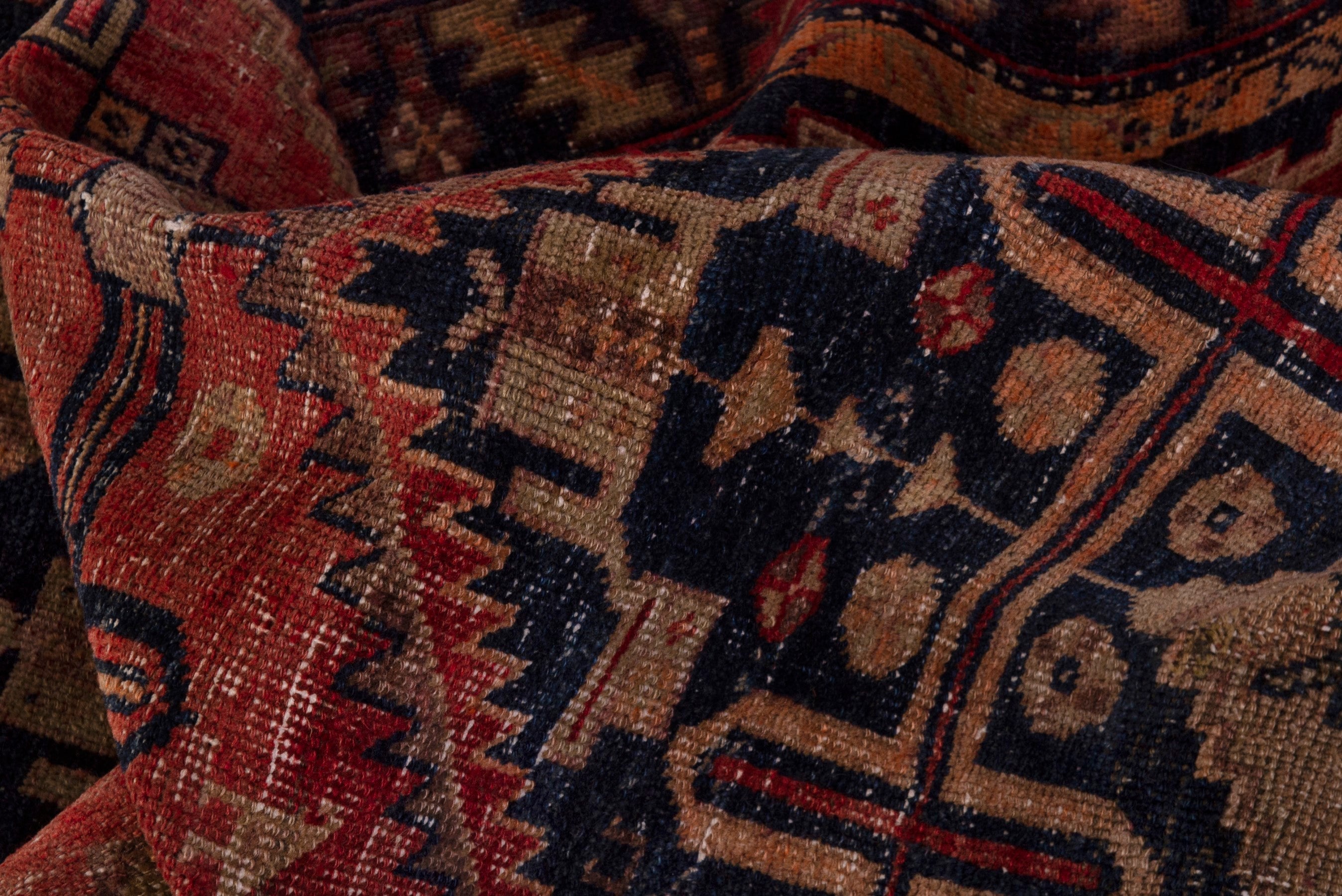 Persian Lori area rug in rust and dark blue, view 18 of 21