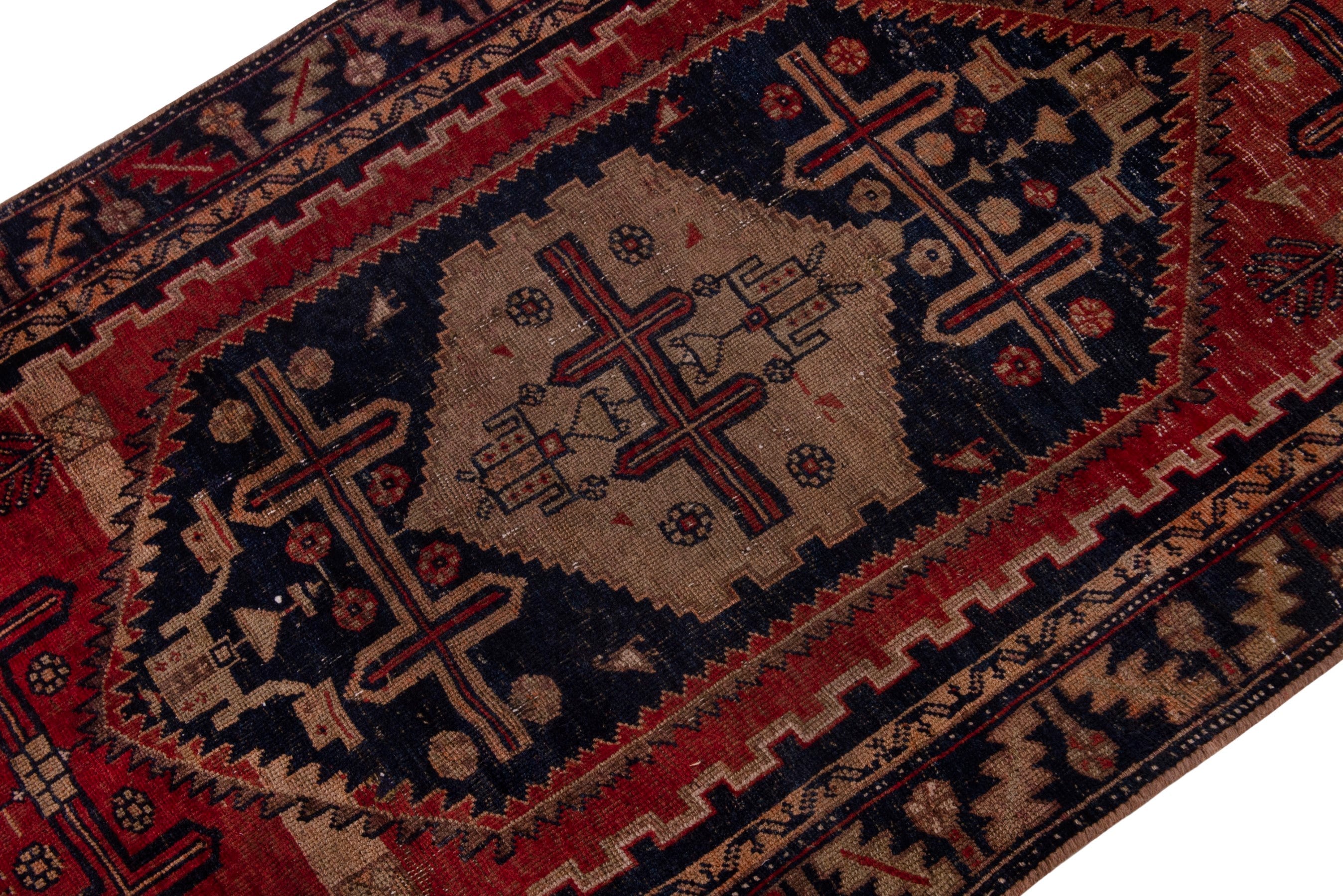 Persian Lori area rug in rust and dark blue, view 4 of 21