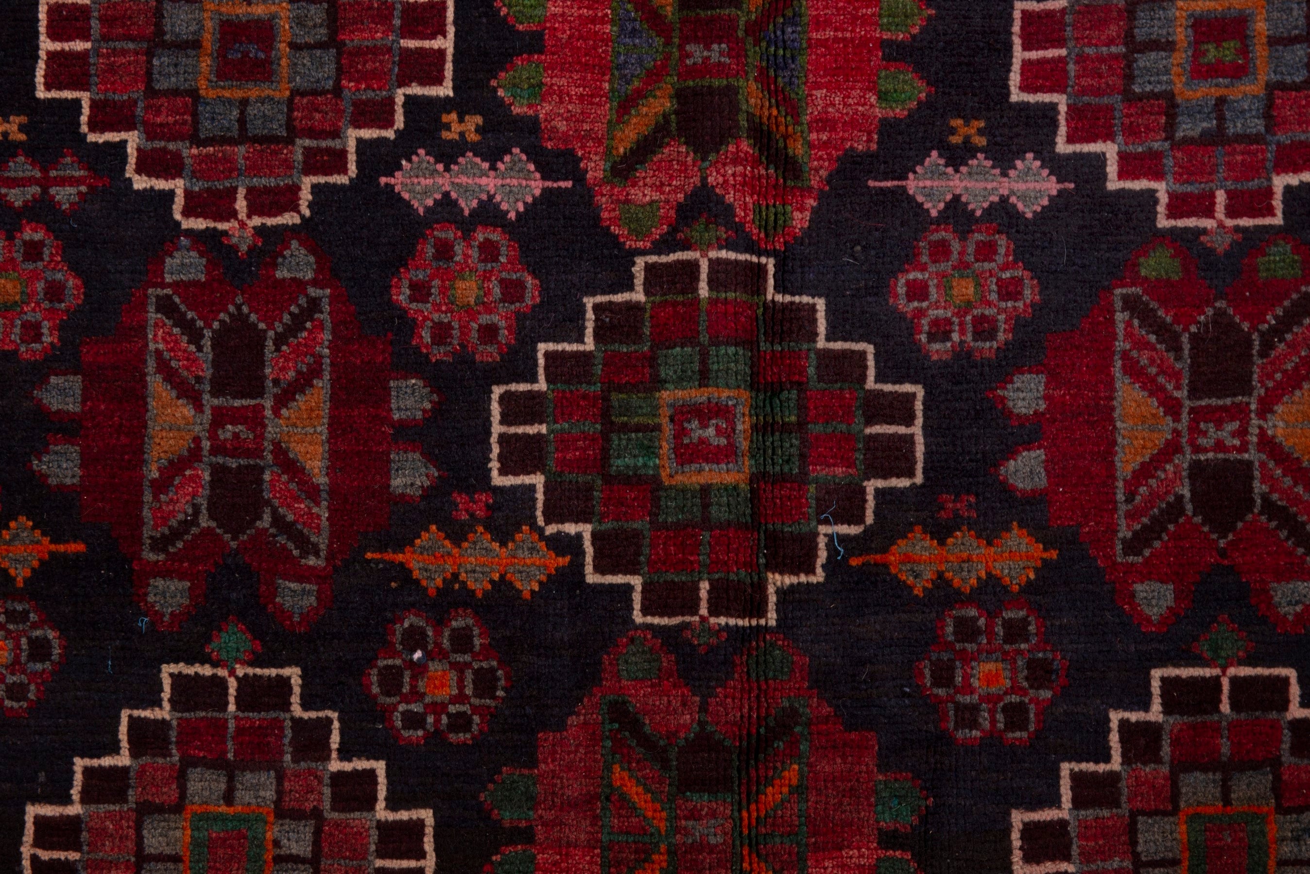 Persian Ferdos area rug in navy and deep red, view 13 of 20