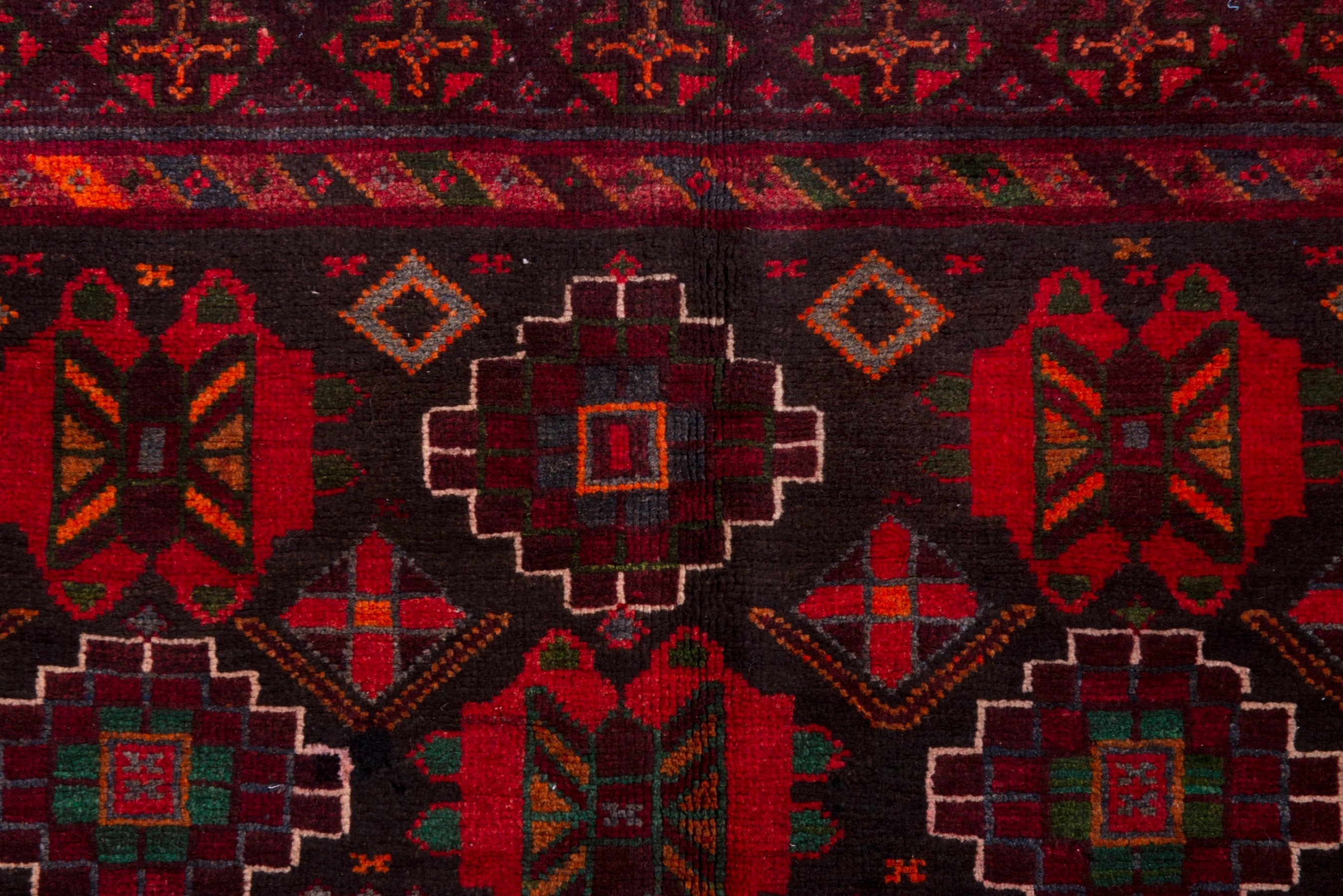 Persian Ferdos area rug in navy and deep red, view 15 of 20