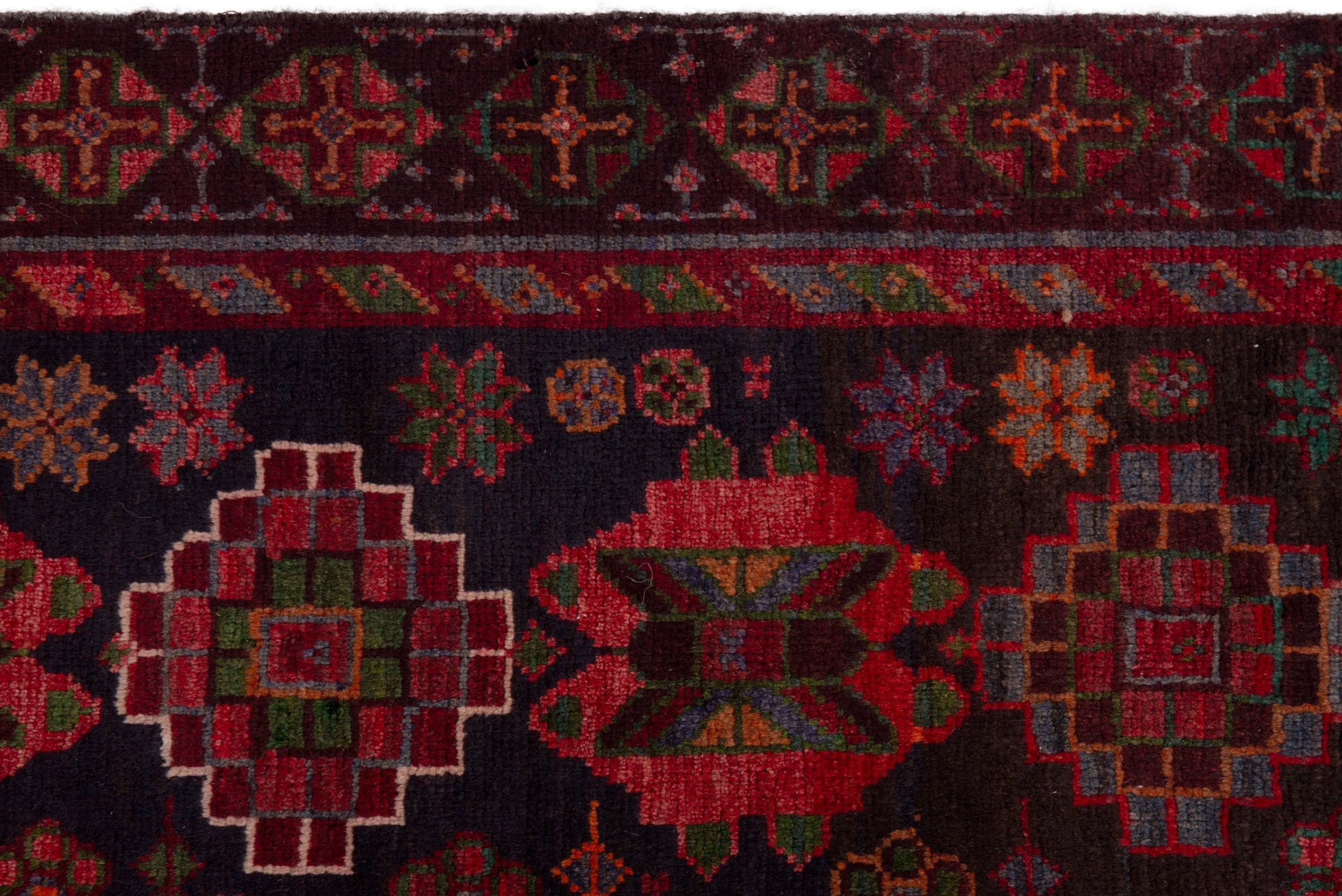 Persian Ferdos area rug in navy and deep red, view 16 of 20