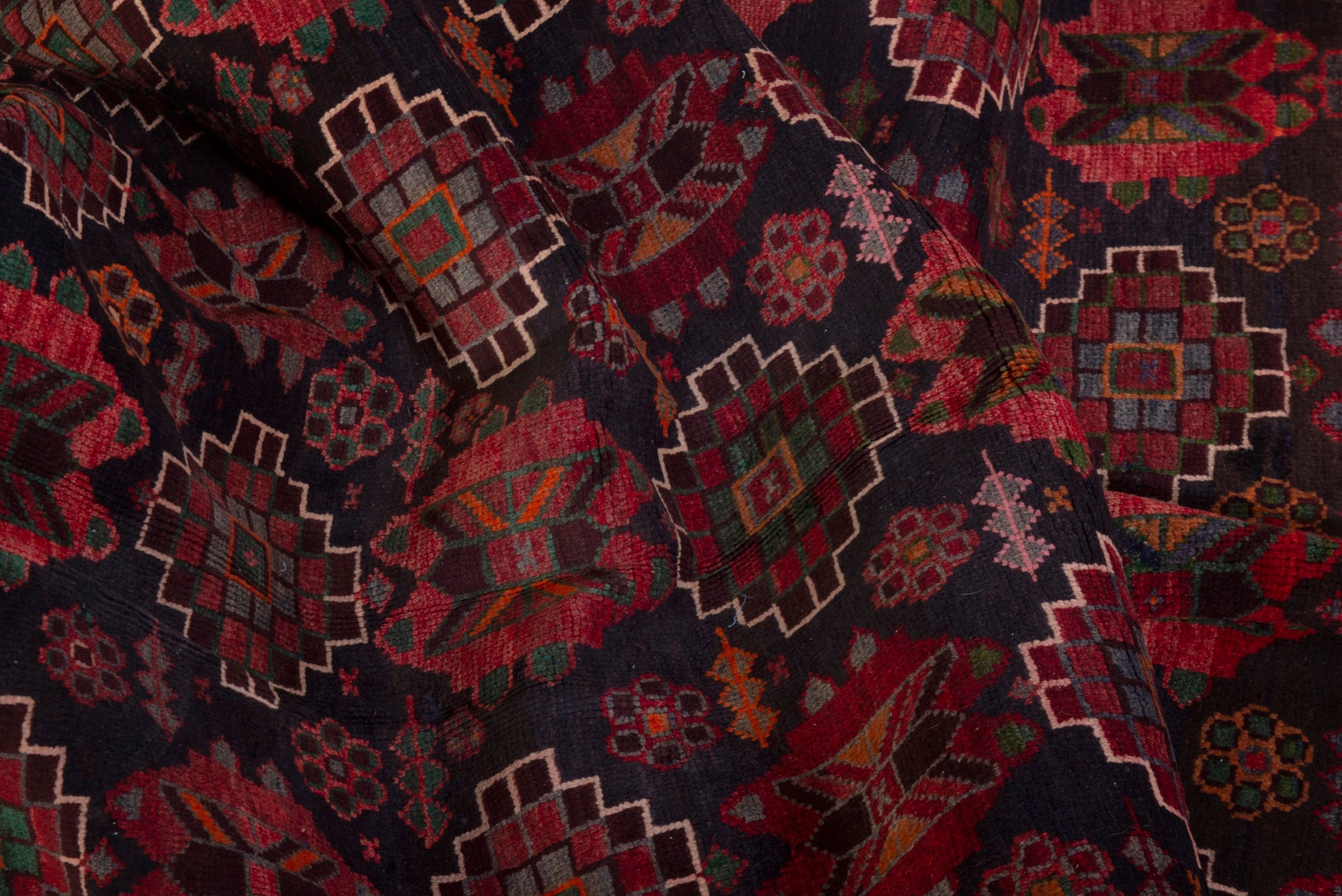Persian Ferdos area rug in navy and deep red, view 17 of 20