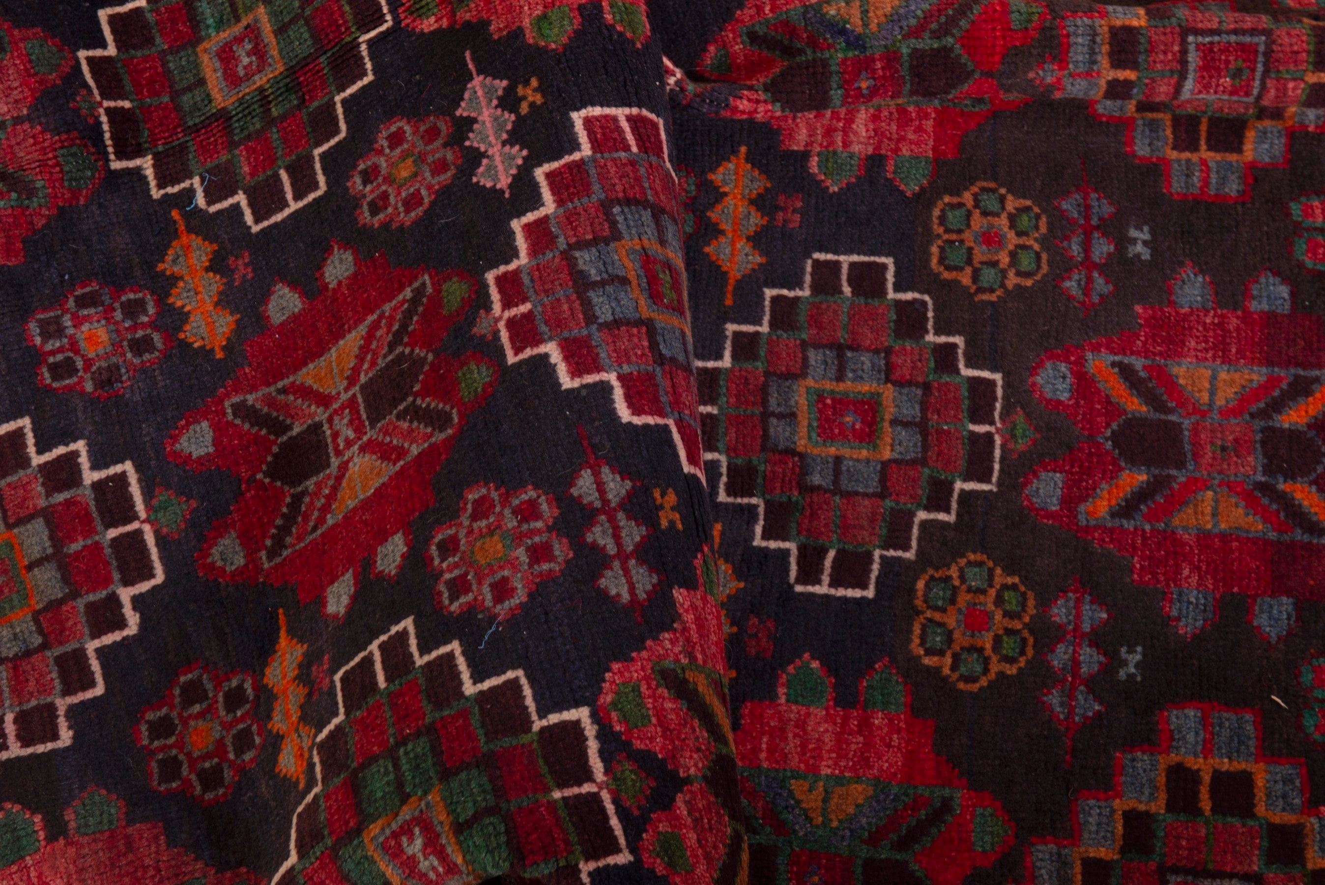 Persian Ferdos area rug in navy and deep red, view 18 of 20