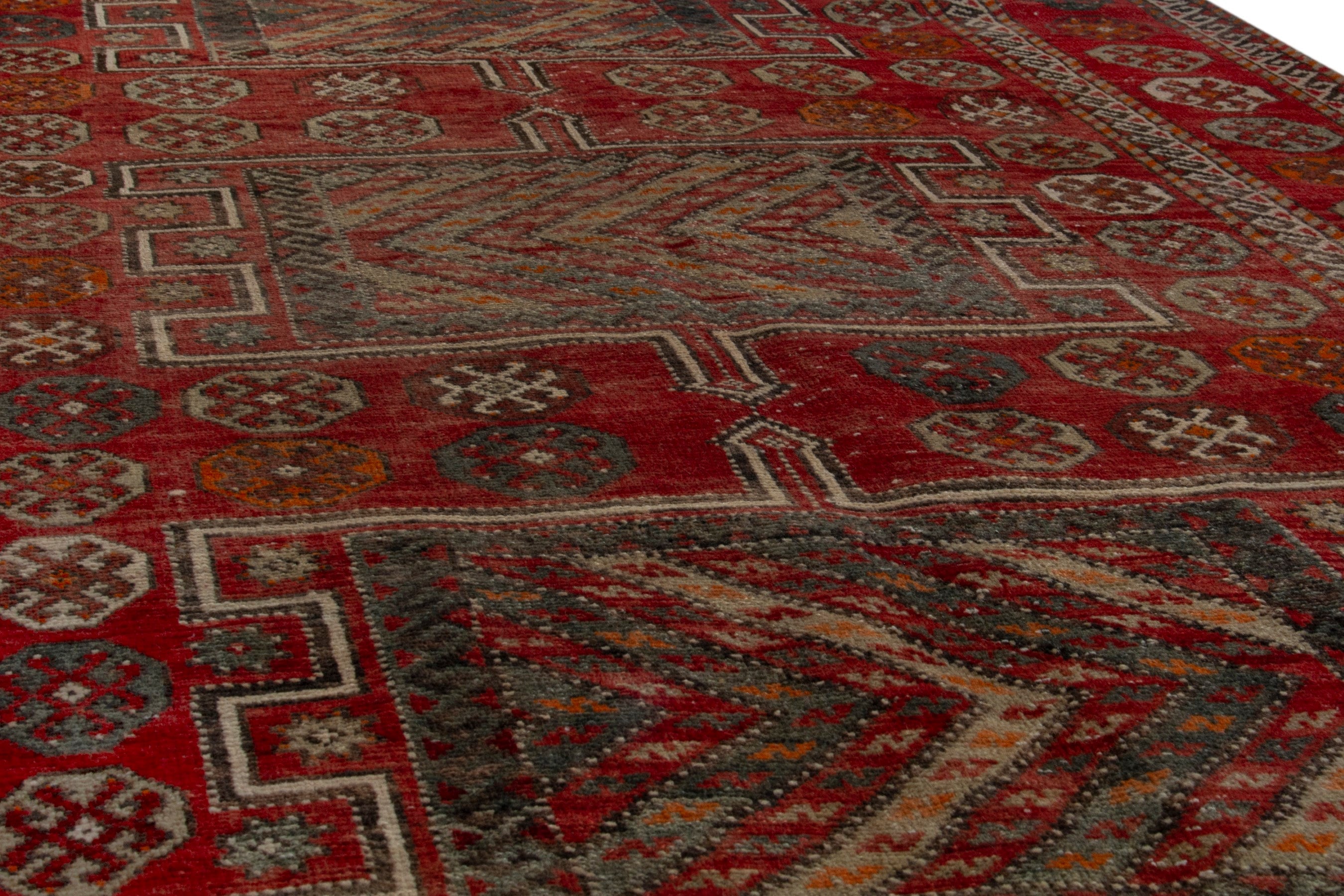 Persian Ghoochan area rug in deep red and rust, view 11 of 19