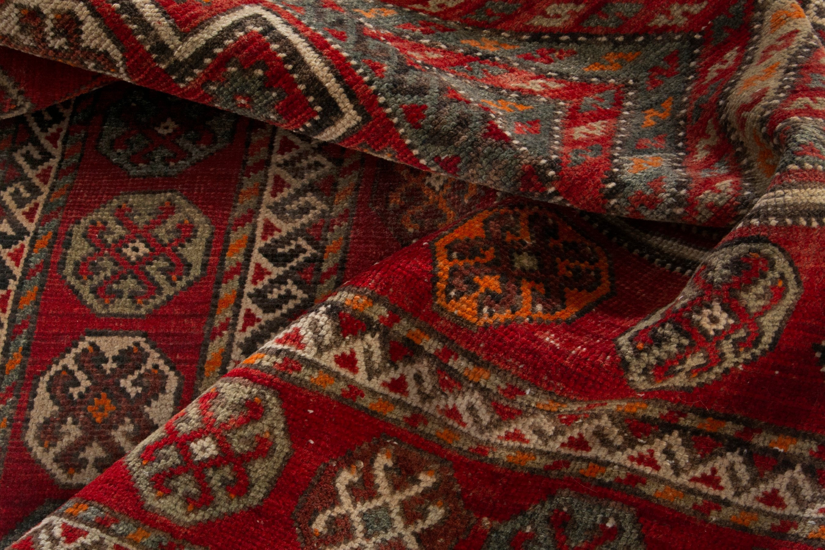 Persian Ghoochan area rug in deep red and rust, view 17 of 19