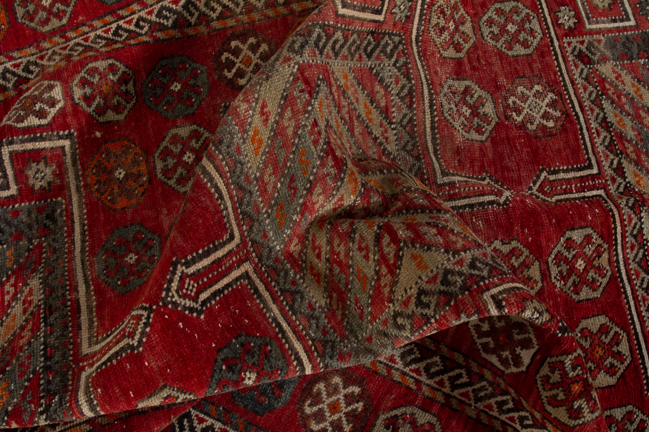Persian Ghoochan area rug in deep red and rust, view 18 of 19