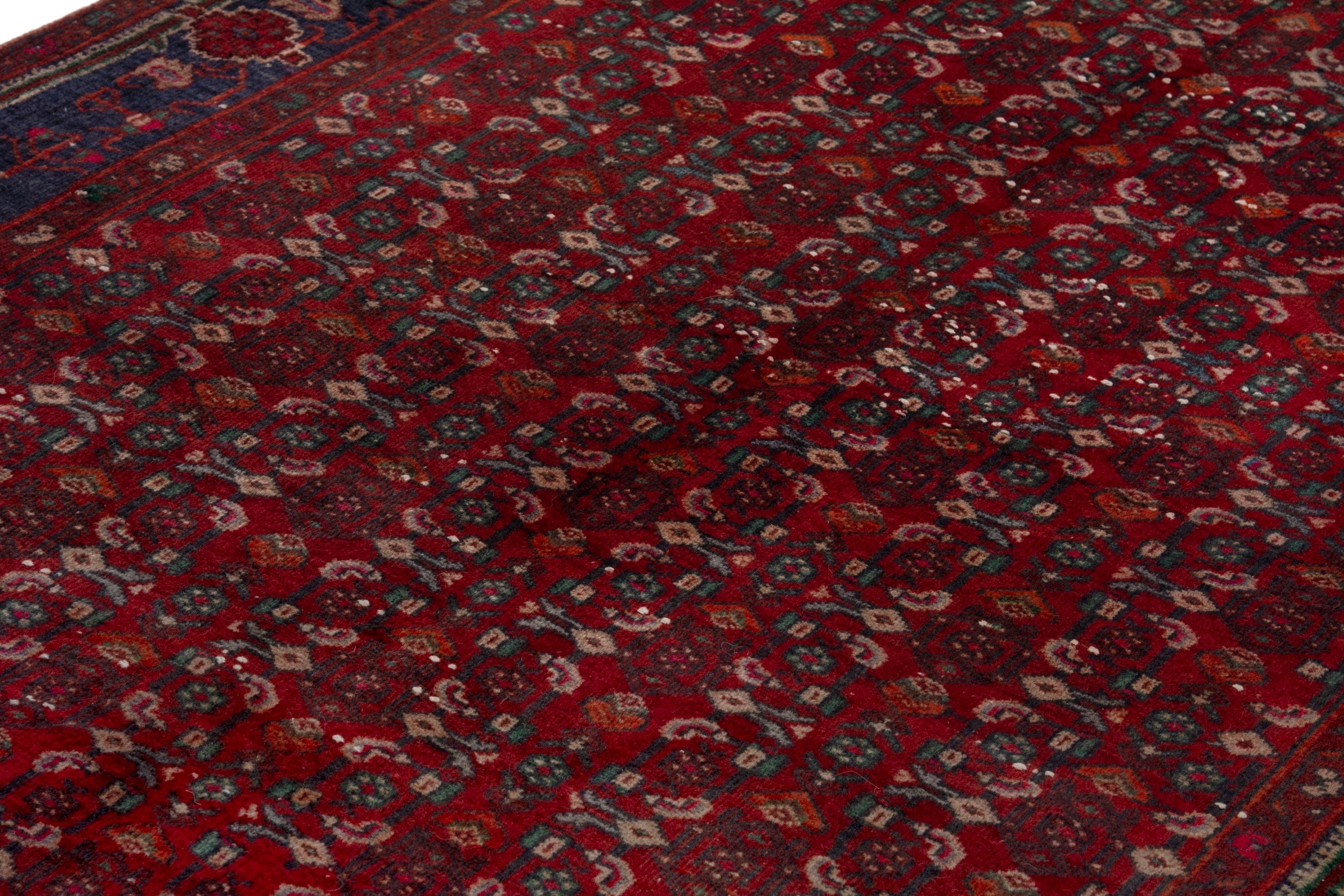 Persian Kordi area rug in deep red and dark blue, view 10 of 18