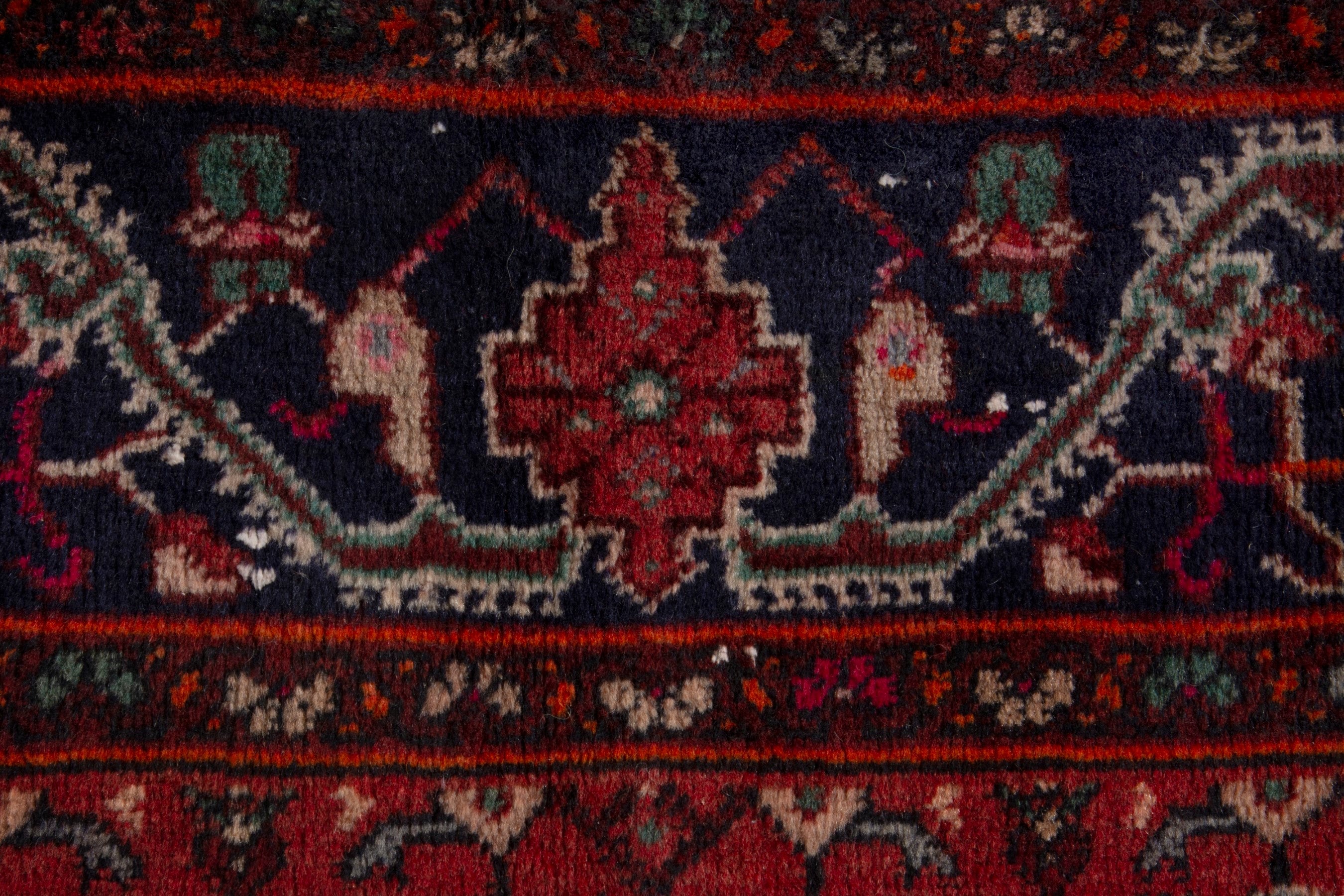 Persian Kordi area rug in deep red and dark blue, view 14 of 18