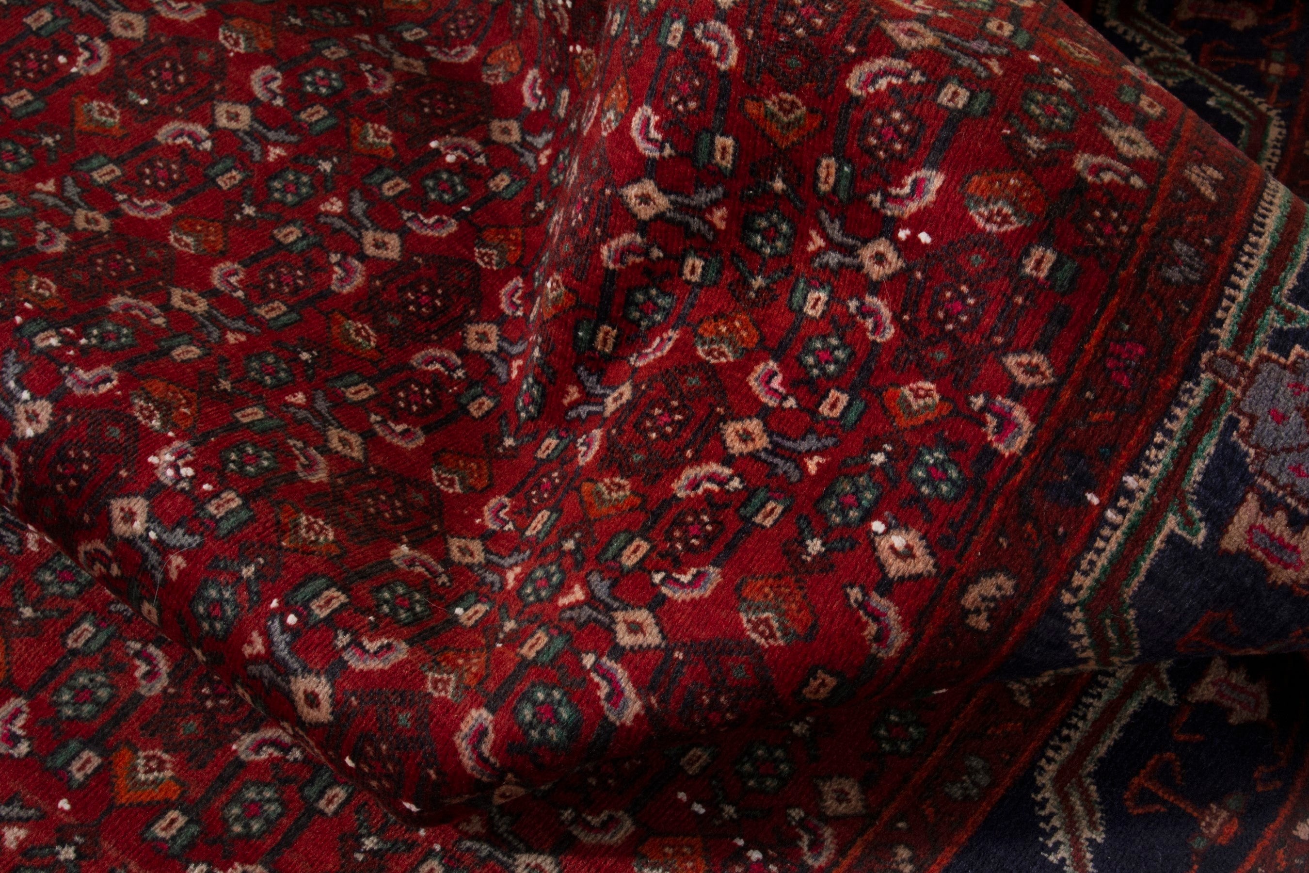 Persian Kordi area rug in deep red and dark blue, view 16 of 18