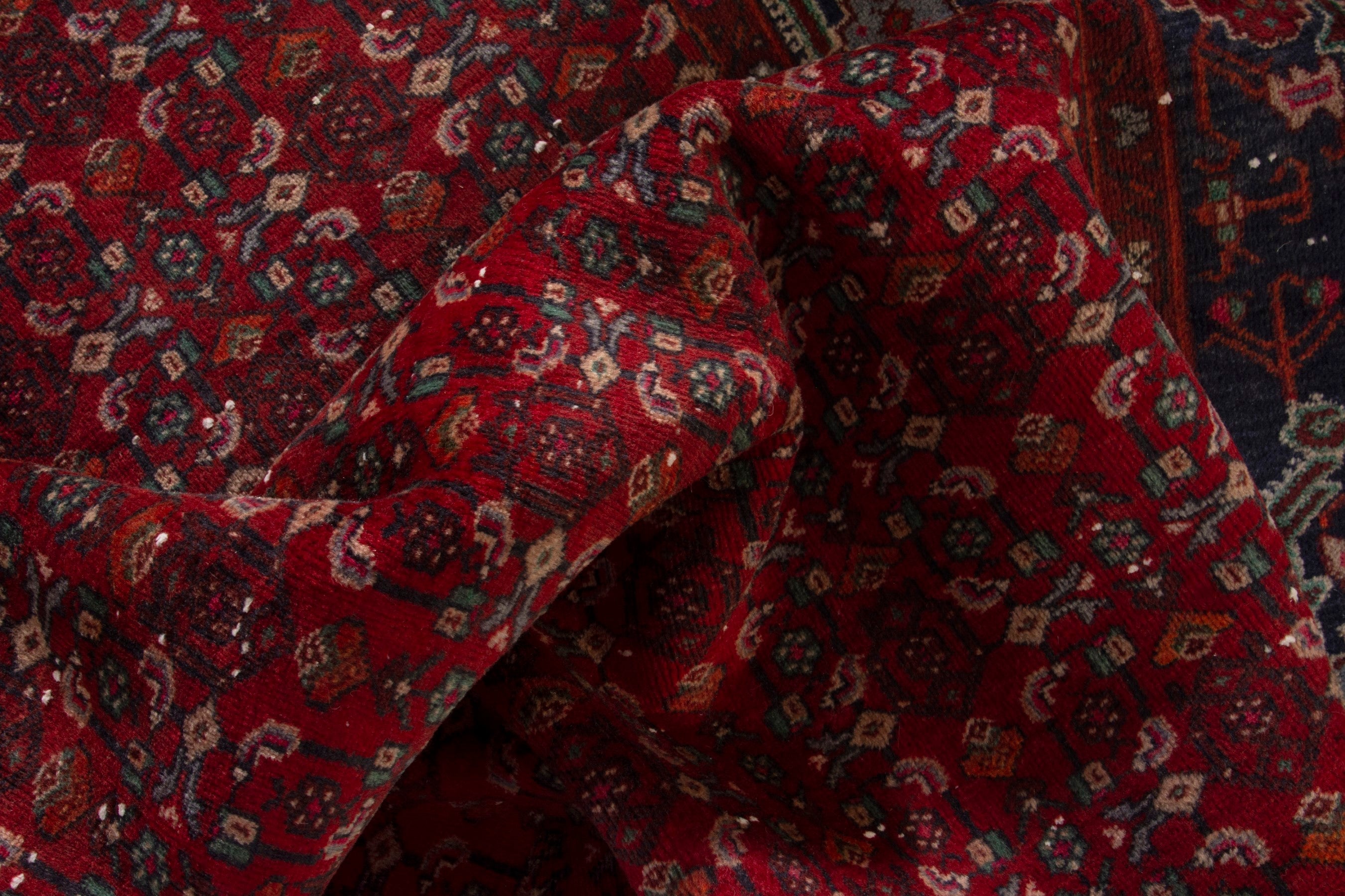 Persian Kordi area rug in deep red and dark blue, view 17 of 18