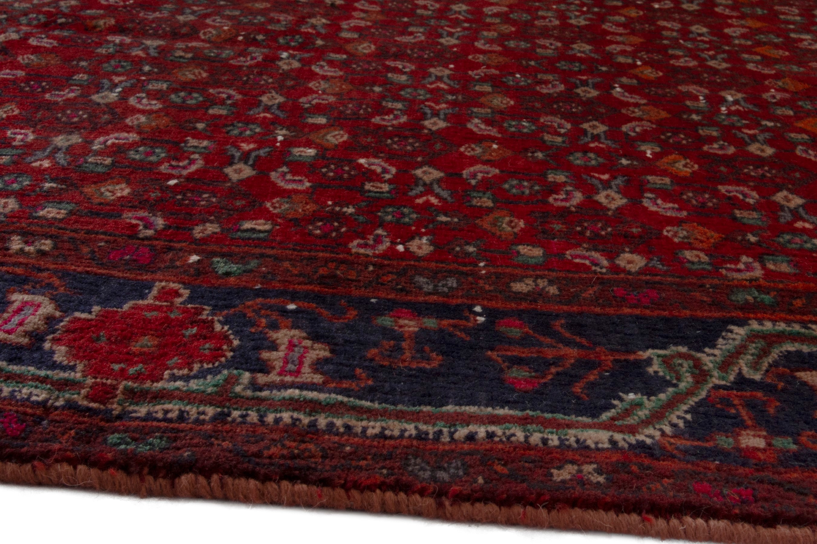 Persian Kordi area rug in deep red and dark blue, view 7 of 18