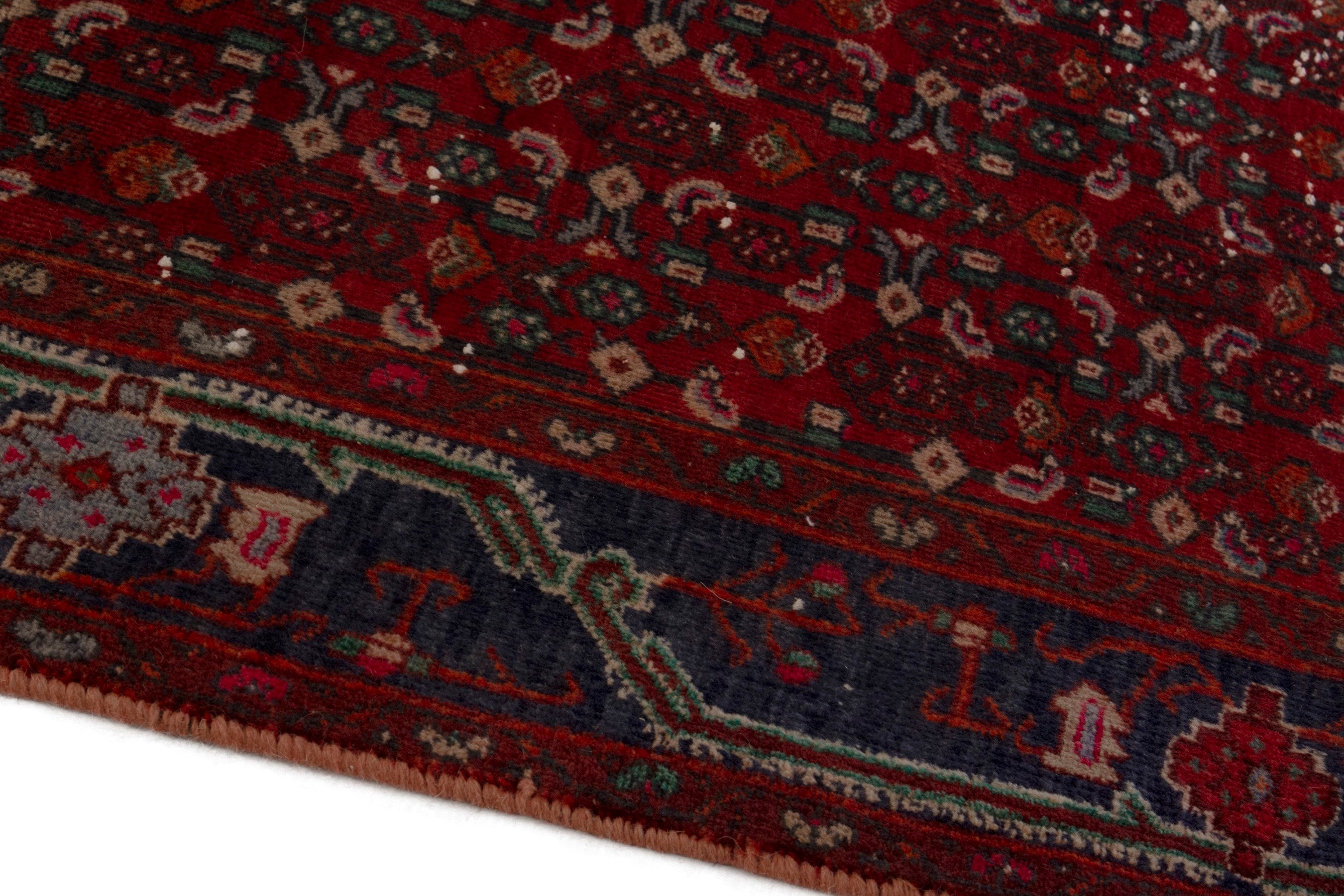 Persian Kordi area rug in deep red and dark blue, view 9 of 18
