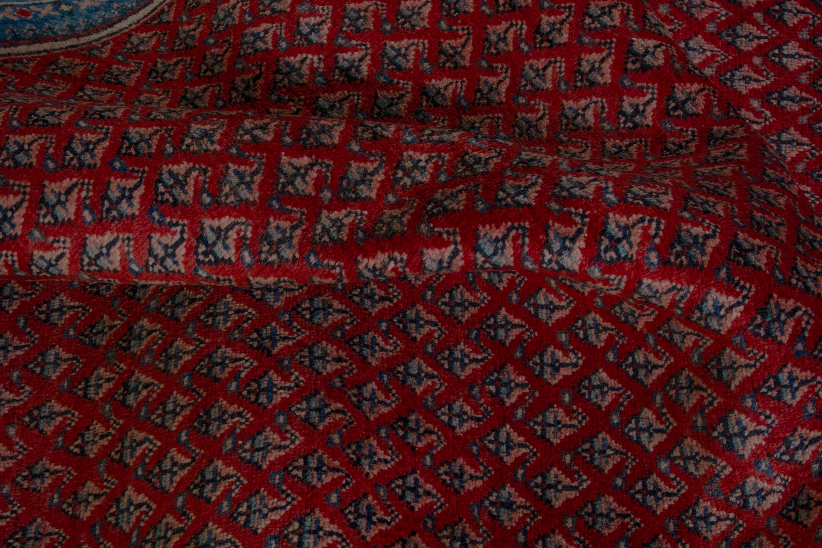 Persian Arak area rug in deep red and dark blue, view 15 of 19