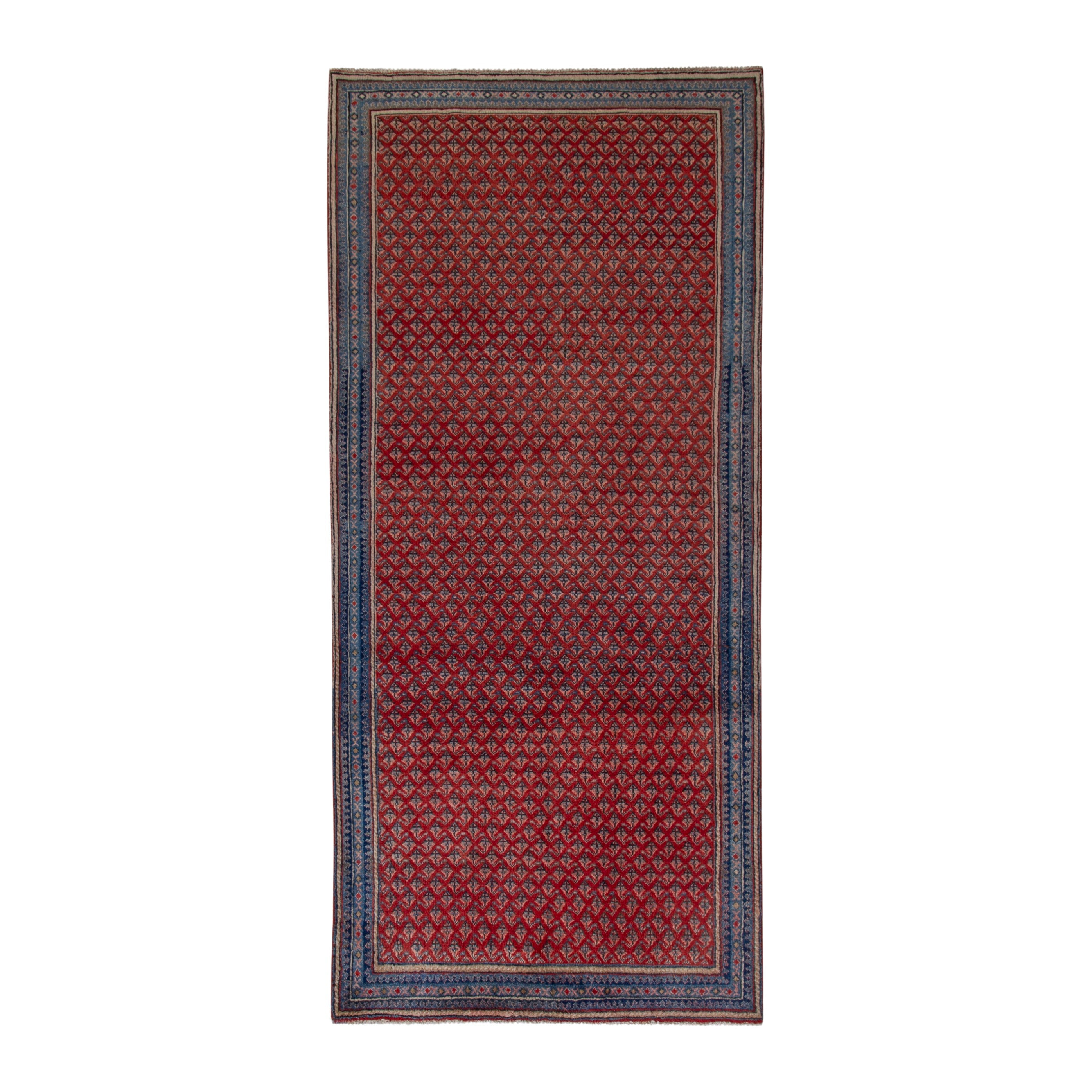 Persian Arak area rug in deep red and dark blue, 4'3" x 10'3"