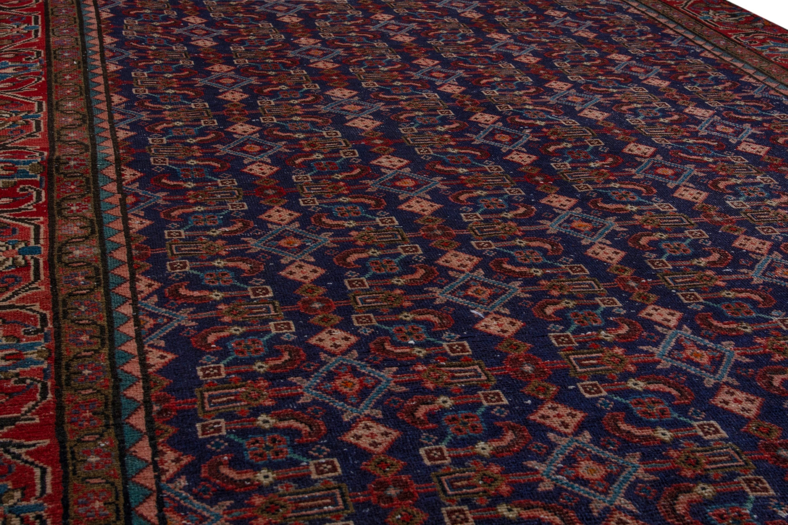 Persian Mahal area rug in navy and deep red, view 10 of 20