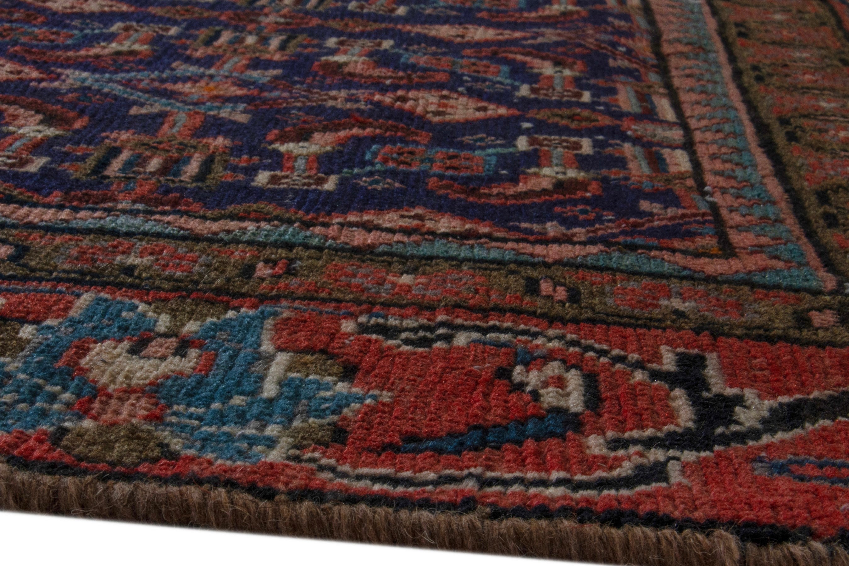 Persian Mahal area rug in navy and deep red, view 11 of 20