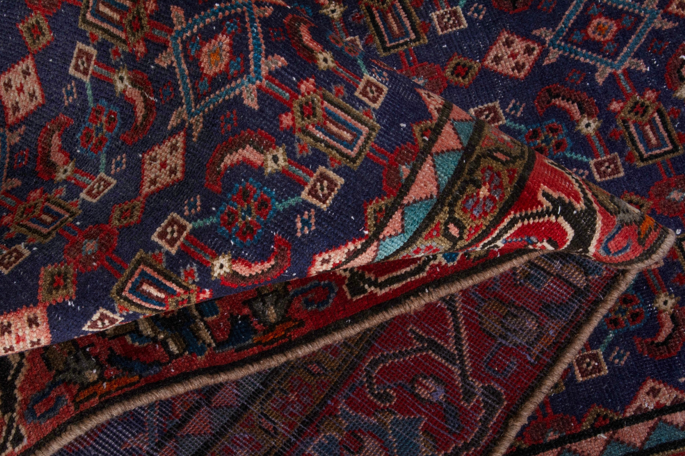 Persian Mahal area rug in navy and deep red, view 17 of 20