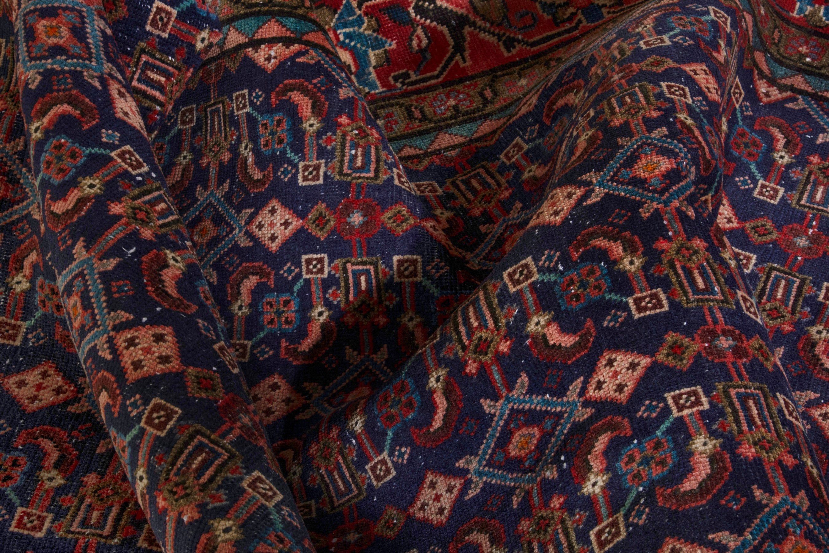Persian Mahal area rug in navy and deep red, view 18 of 20