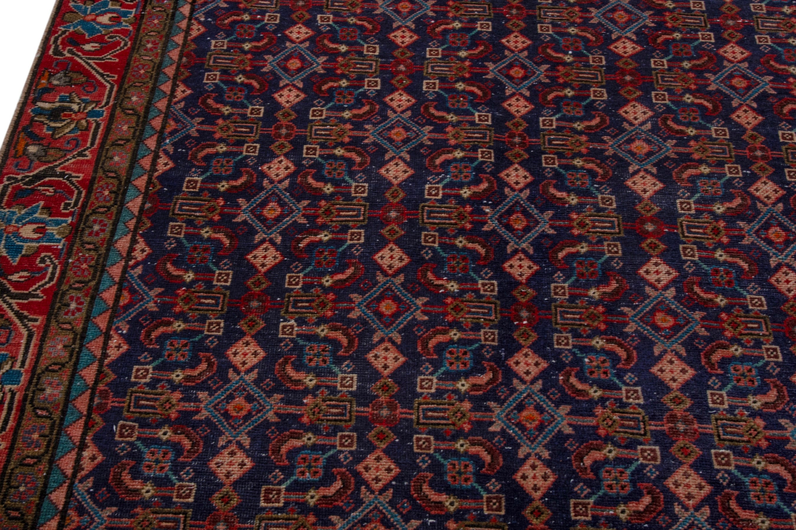 Persian Mahal area rug in navy and deep red, view 7 of 20