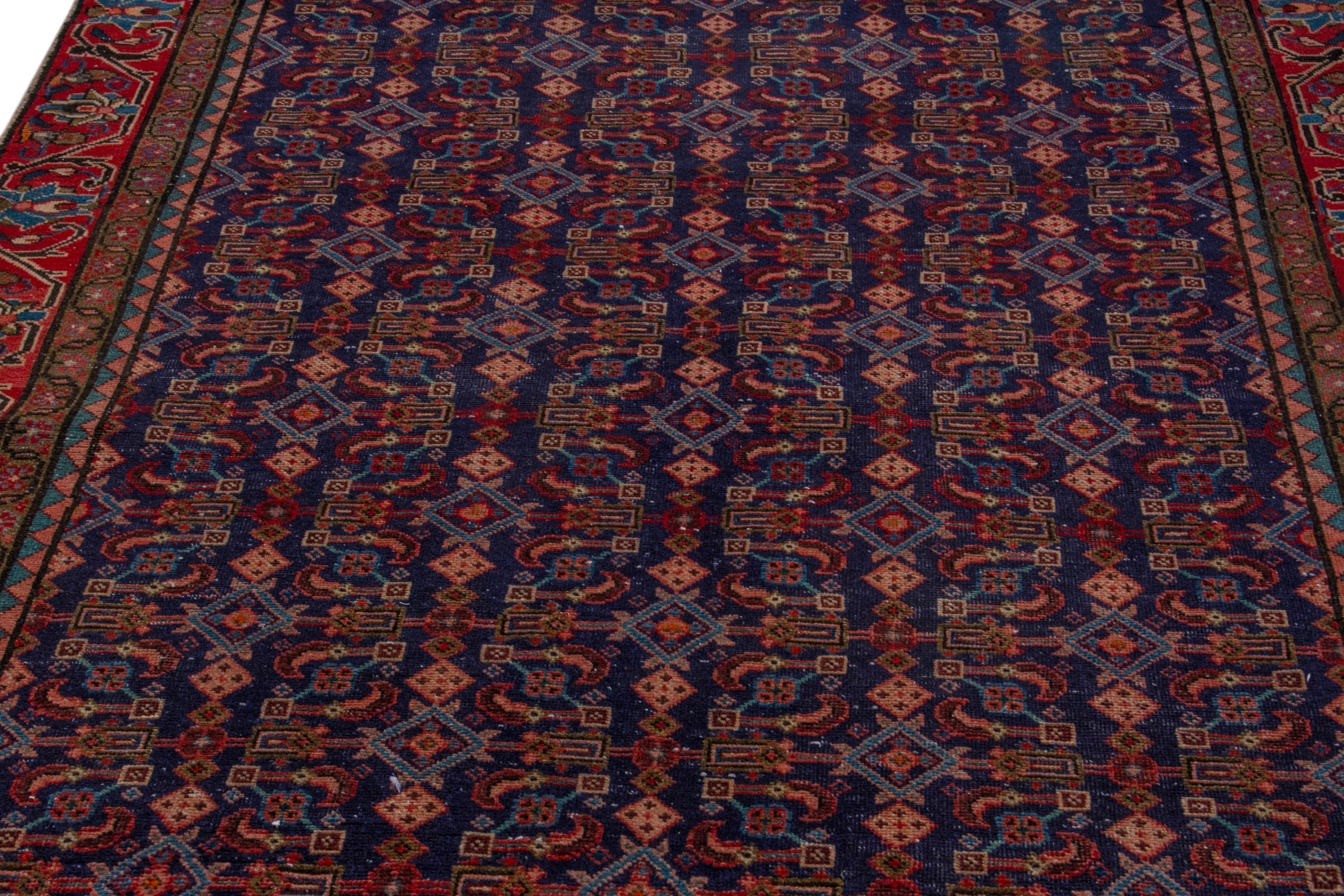 Persian Mahal area rug in navy and deep red, view 9 of 20