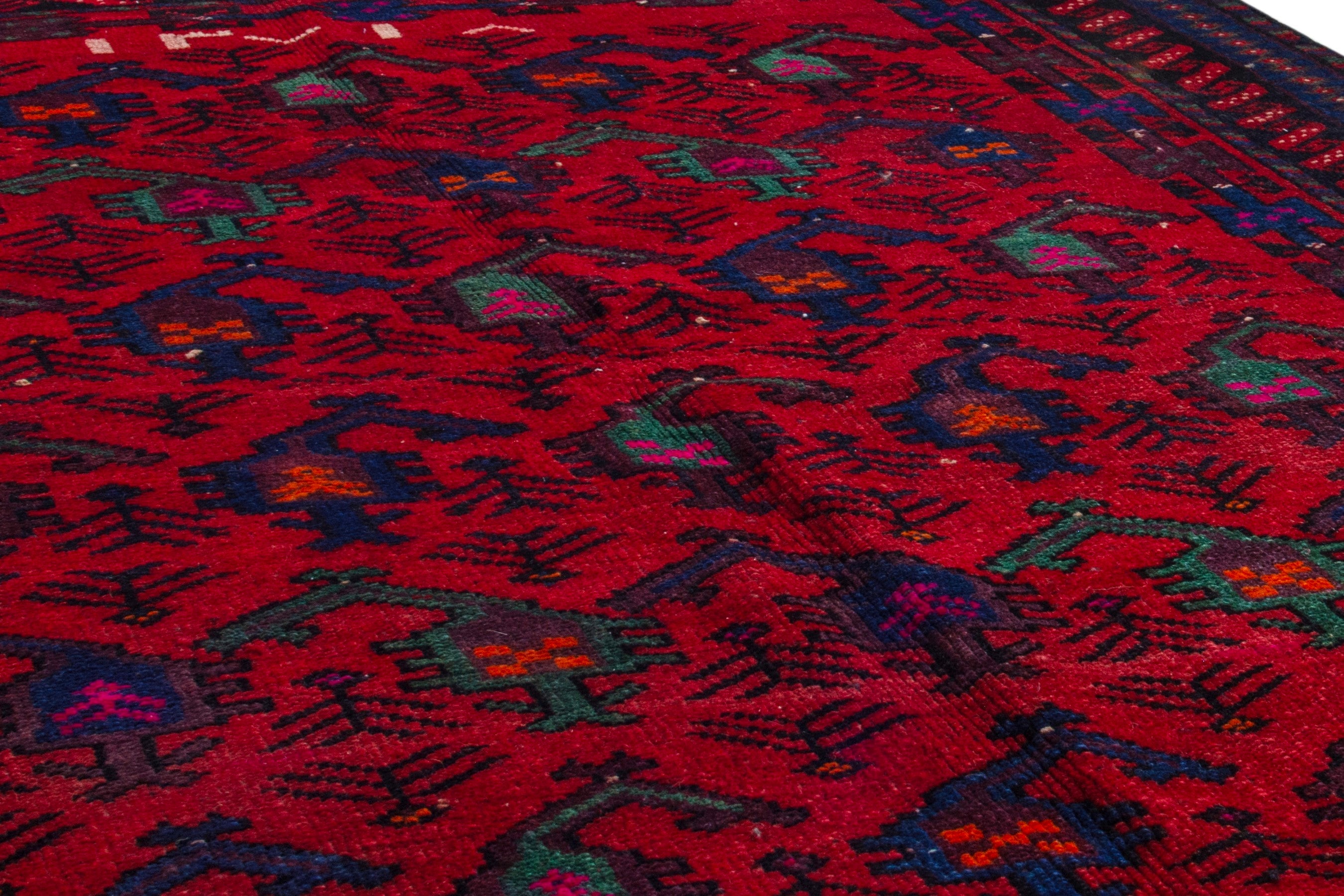 Persian Ghoochan area rug in deep red and navy, view 12 of 21