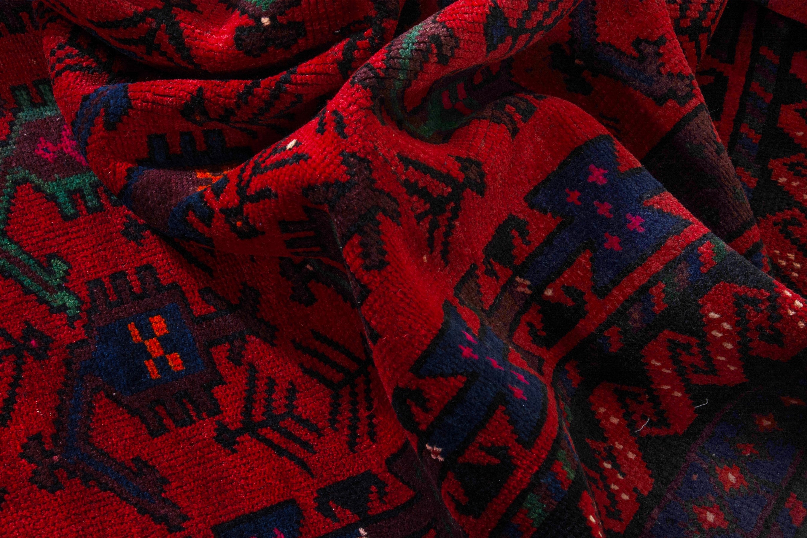 Persian Ghoochan area rug in deep red and navy, view 17 of 21