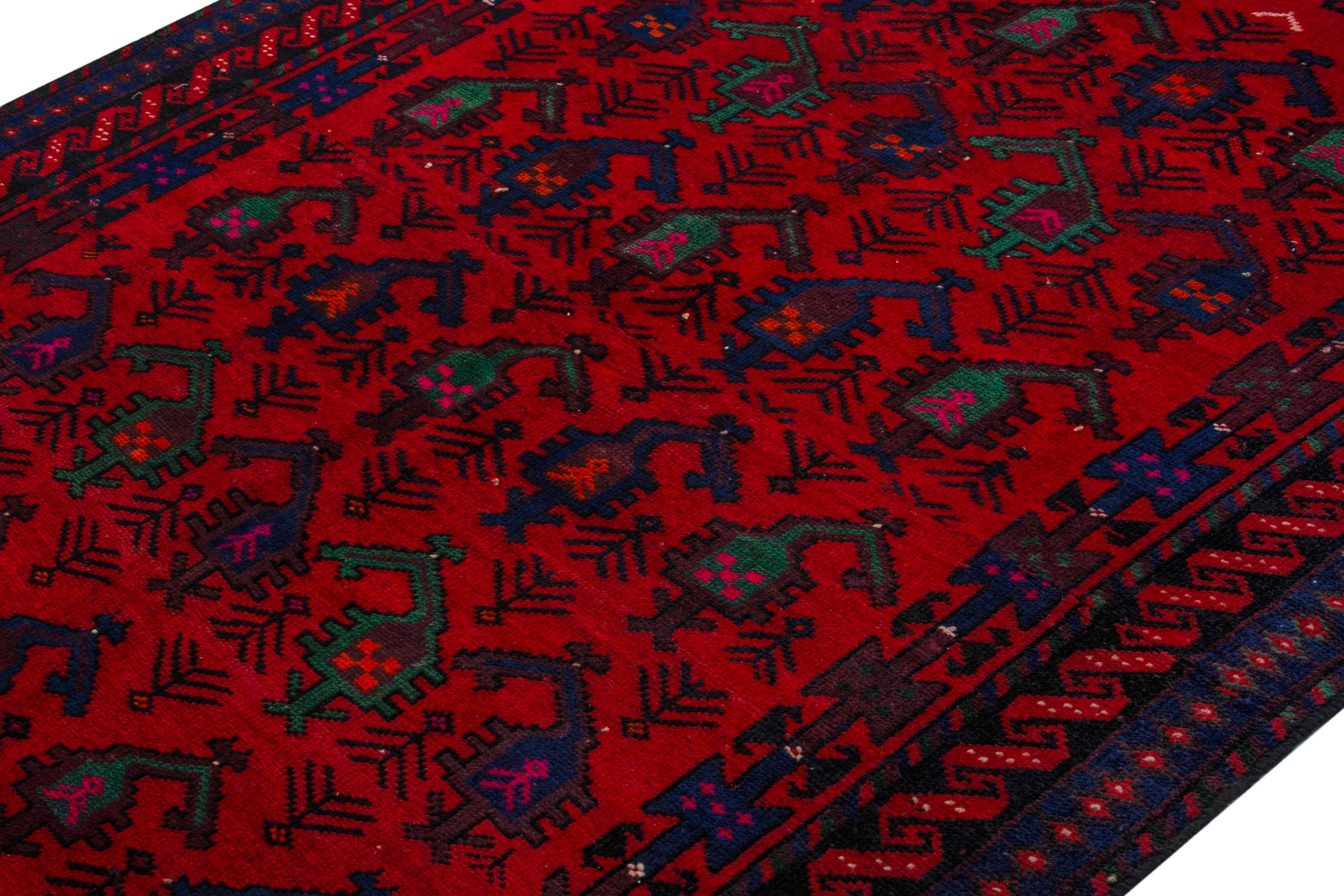 Persian Ghoochan area rug in deep red and navy, view 4 of 21