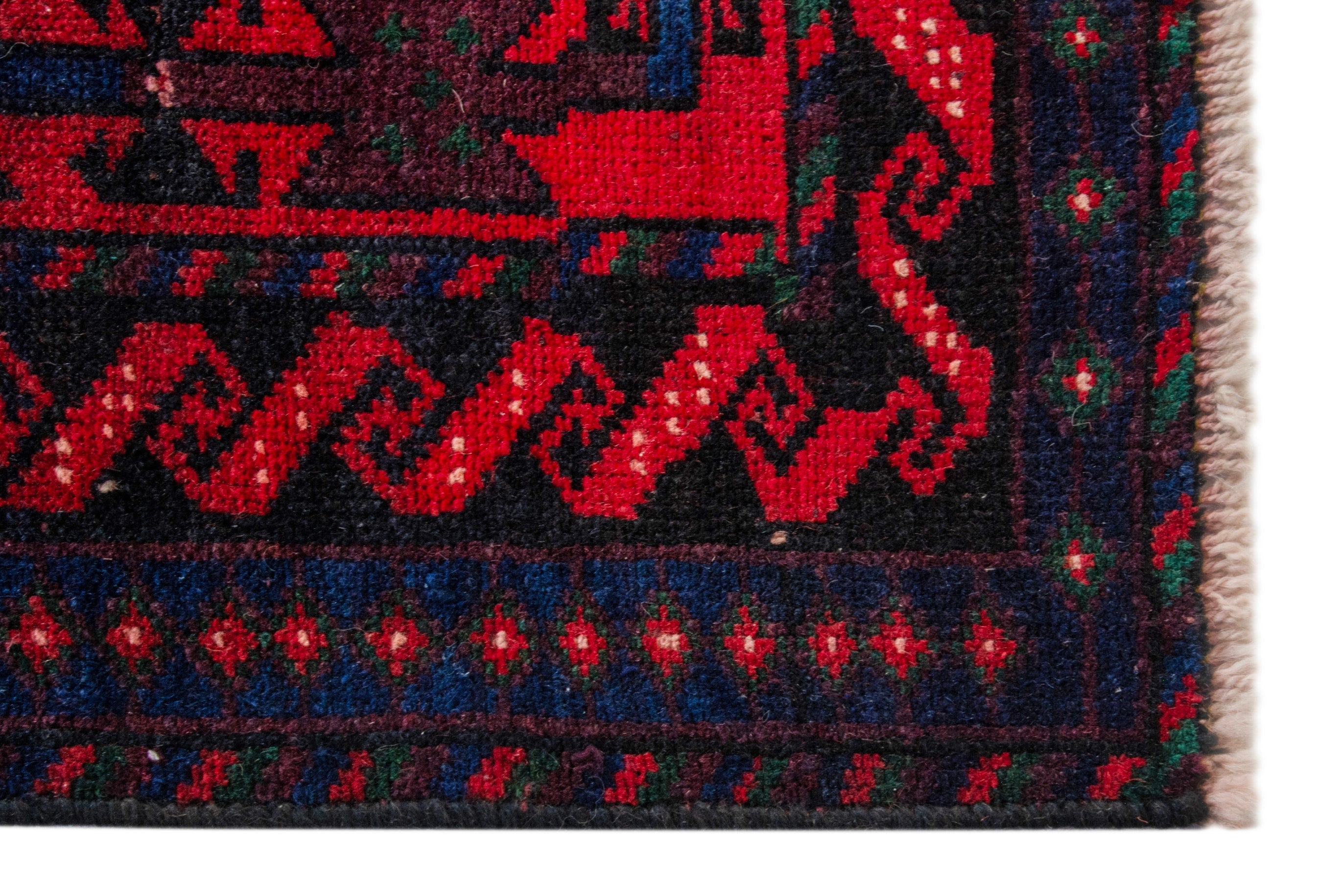 Persian Ghoochan area rug in deep red and navy, view 5 of 21