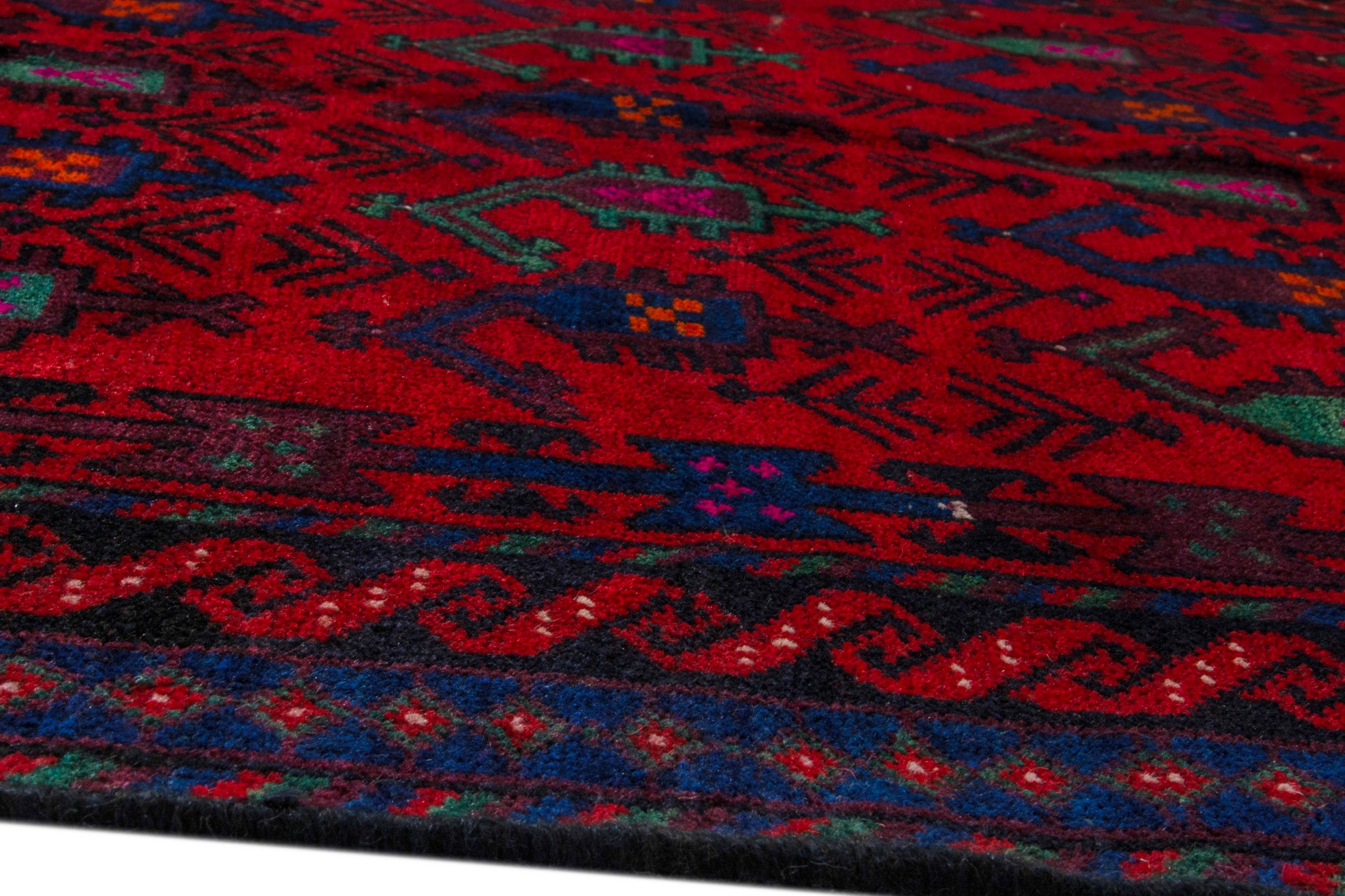 Persian Ghoochan area rug in deep red and navy, view 8 of 21