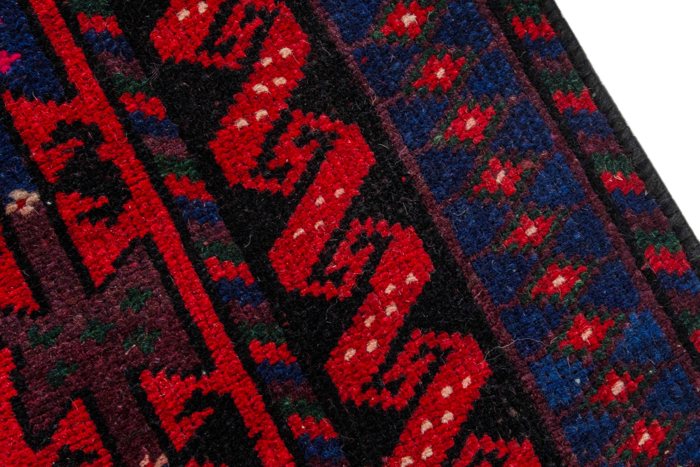 Persian Ghoochan area rug in deep red and navy, view 9 of 21