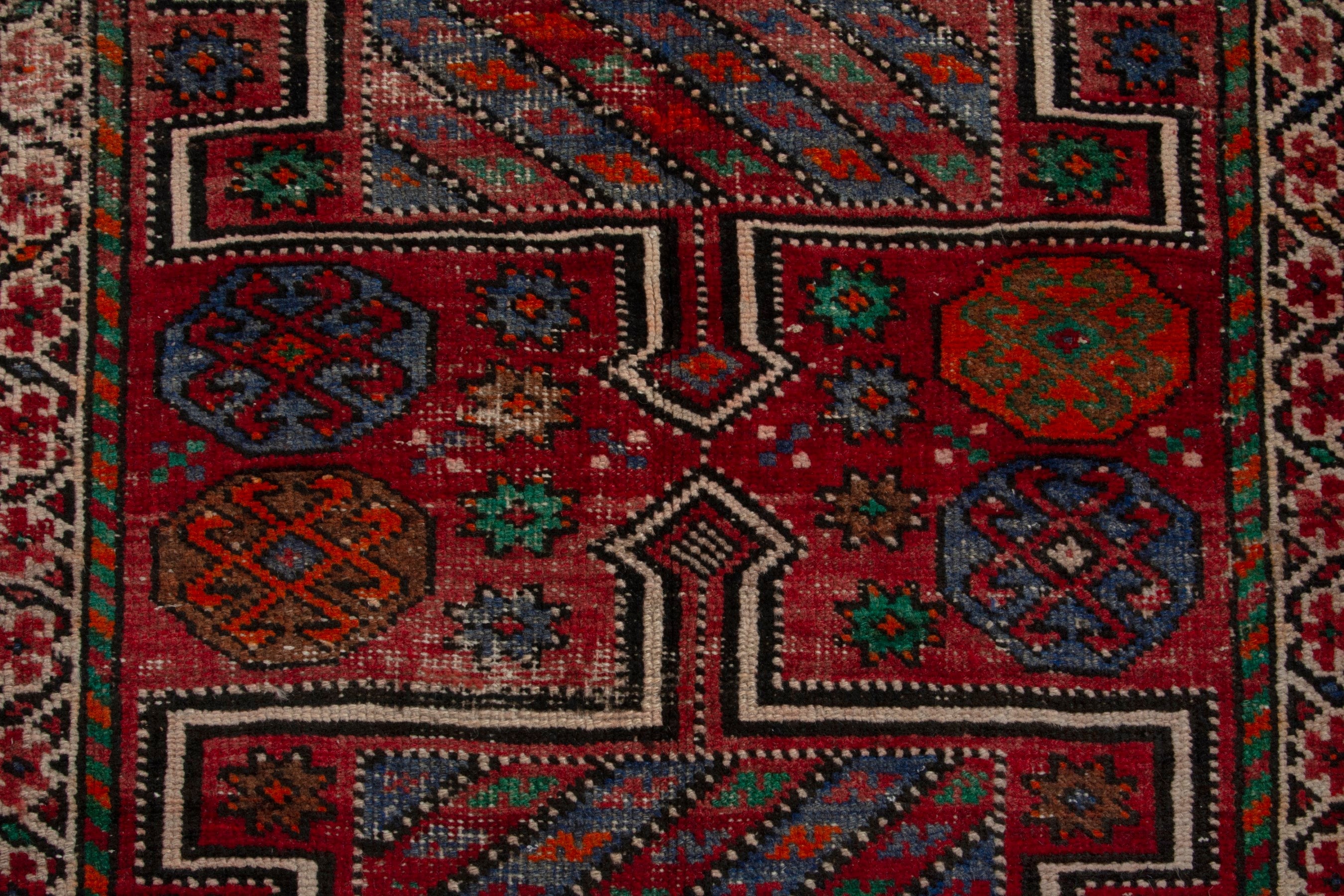 Persian Ghoochan area rug in deep red and burgundy, view 14 of 19