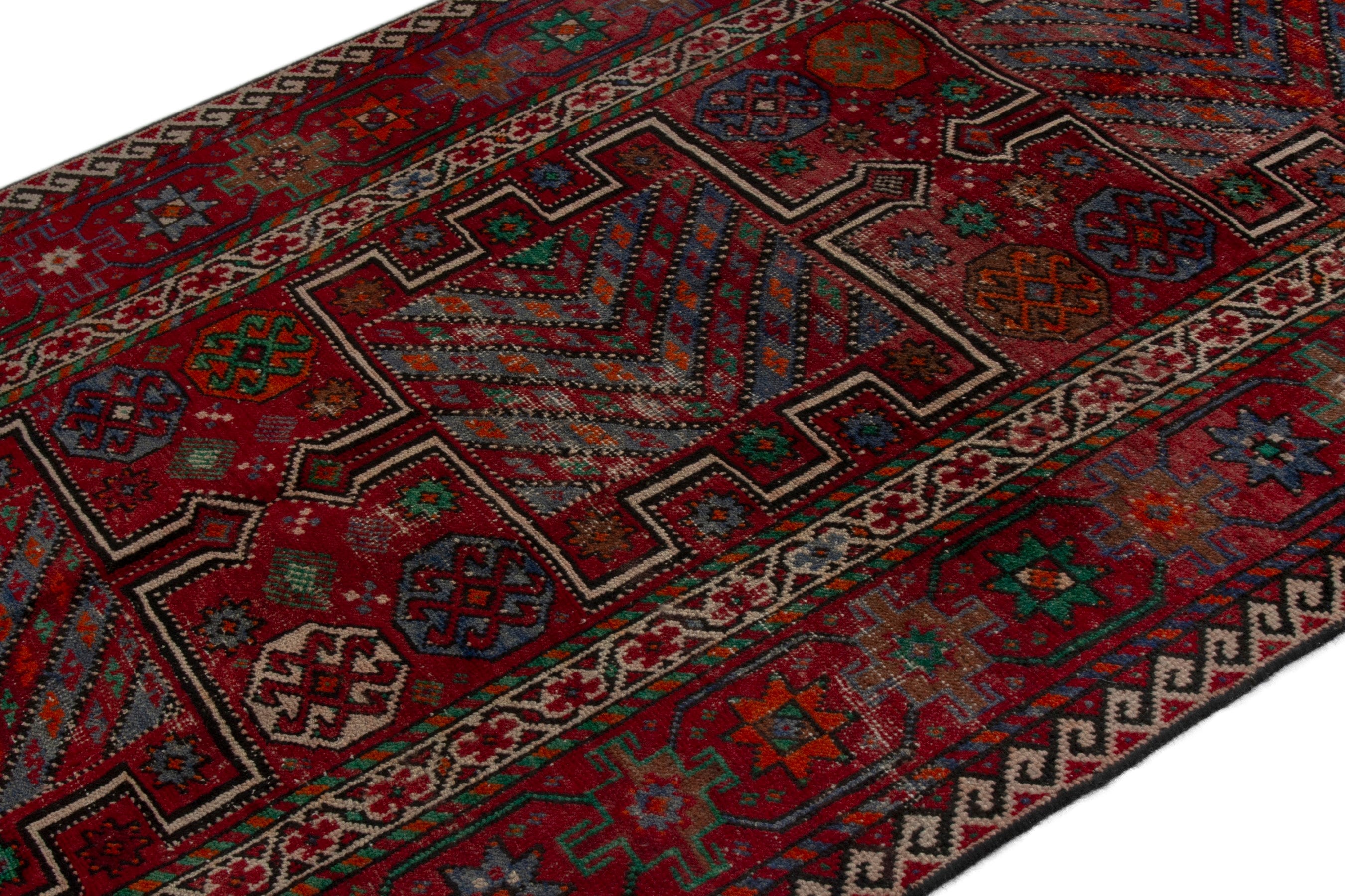 Persian Ghoochan area rug in deep red and burgundy, view 4 of 19