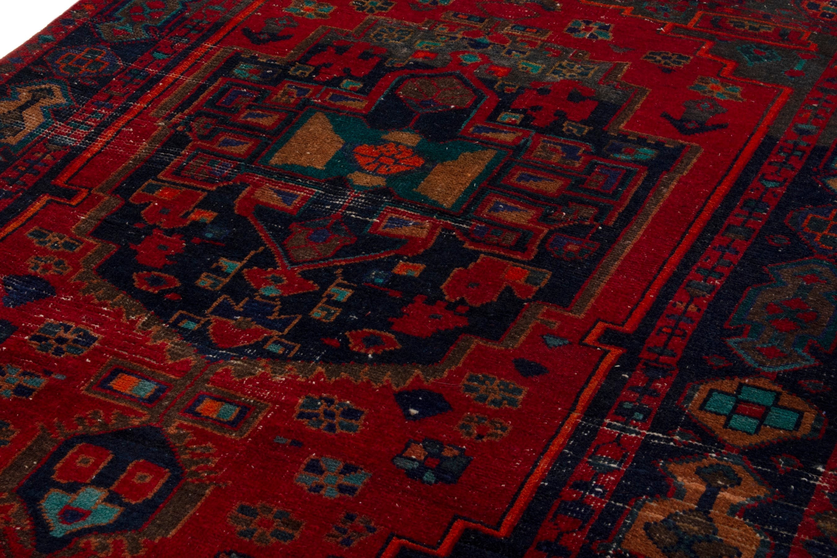 Persian Lori area rug in deep red and dark teal, view 10 of 19