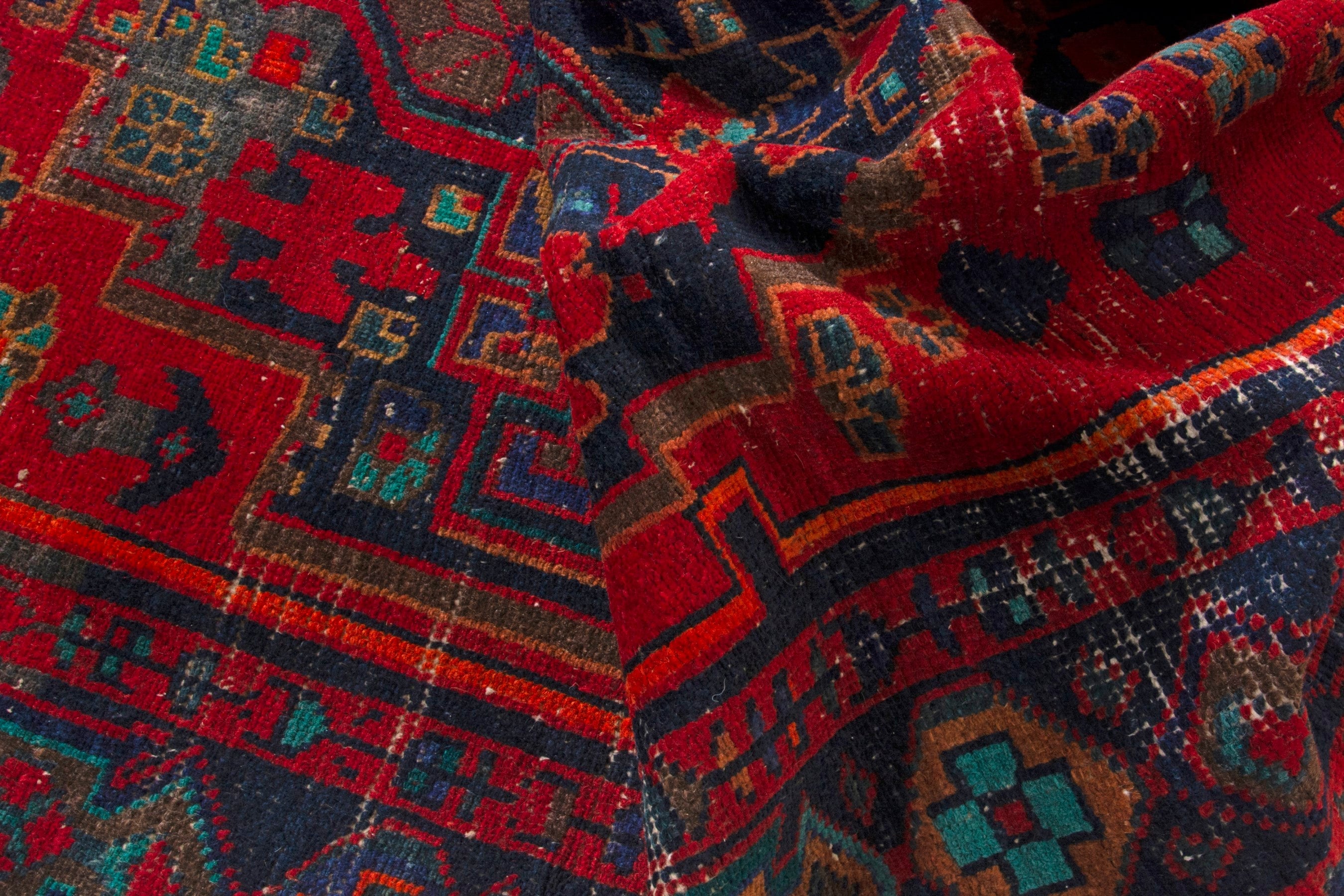 Persian Lori area rug in deep red and dark teal, view 16 of 19