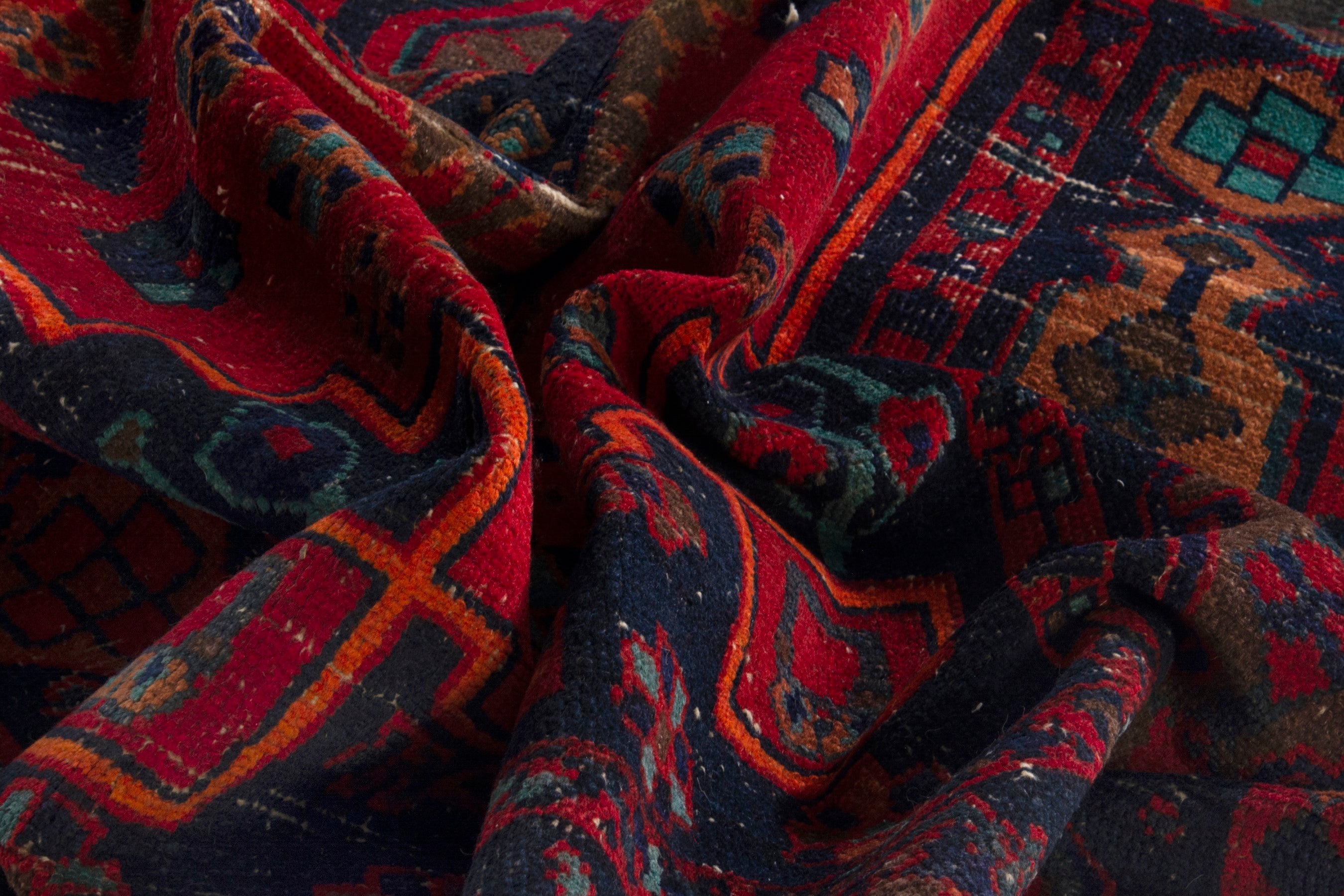 Persian Lori area rug in deep red and dark teal, view 17 of 19