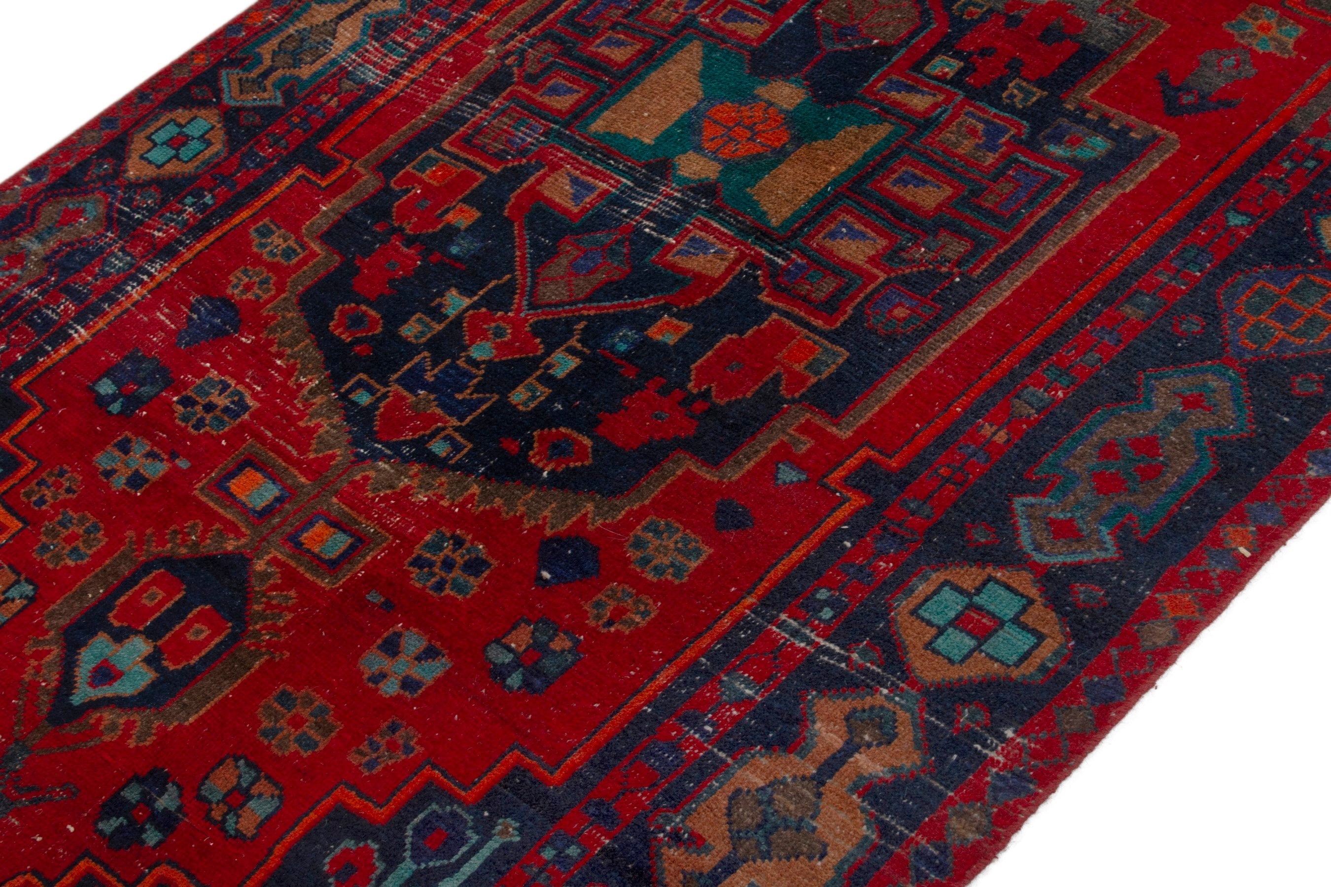 Persian Lori area rug in deep red and dark teal, view 4 of 19