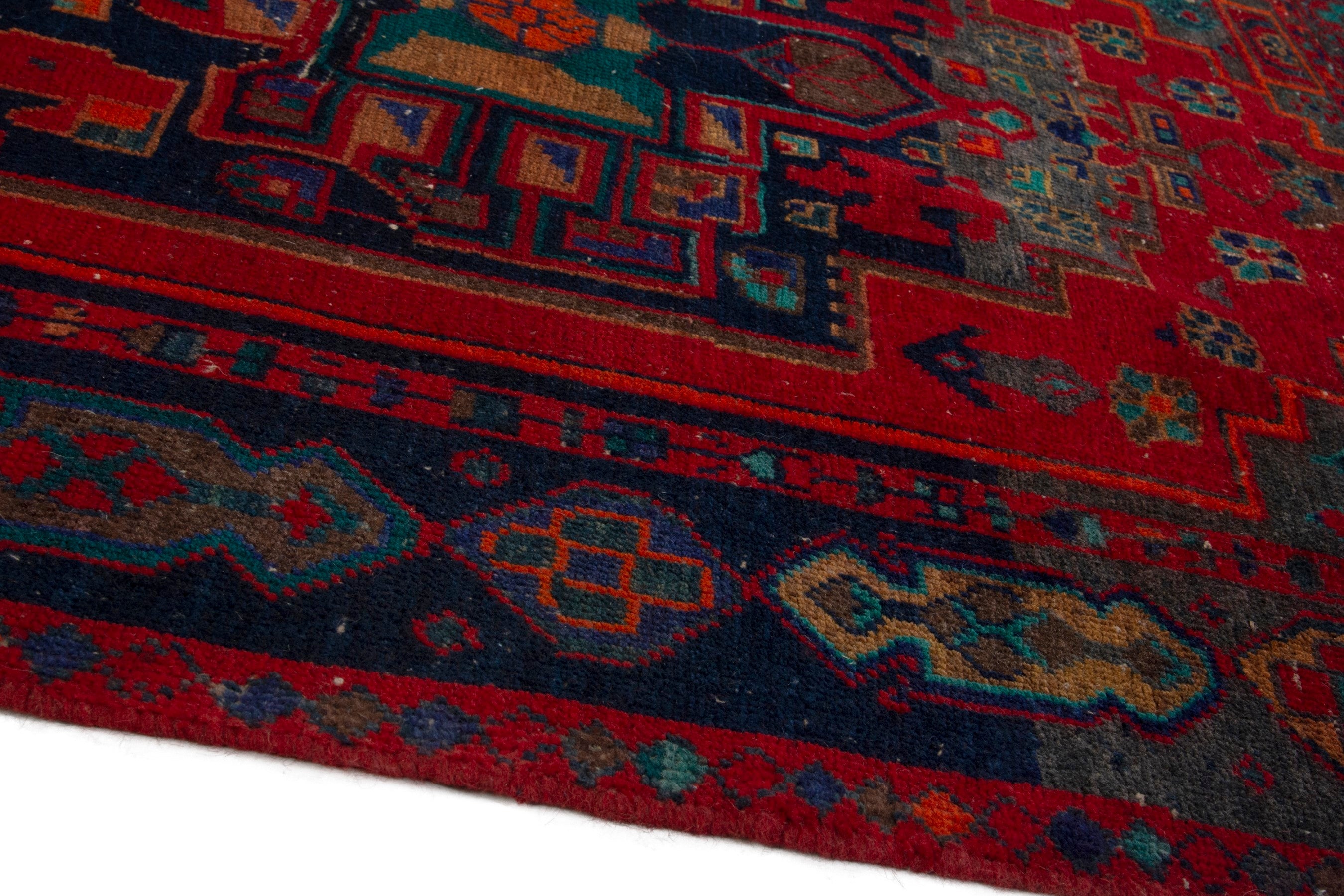 Persian Lori area rug in deep red and dark teal, view 9 of 19
