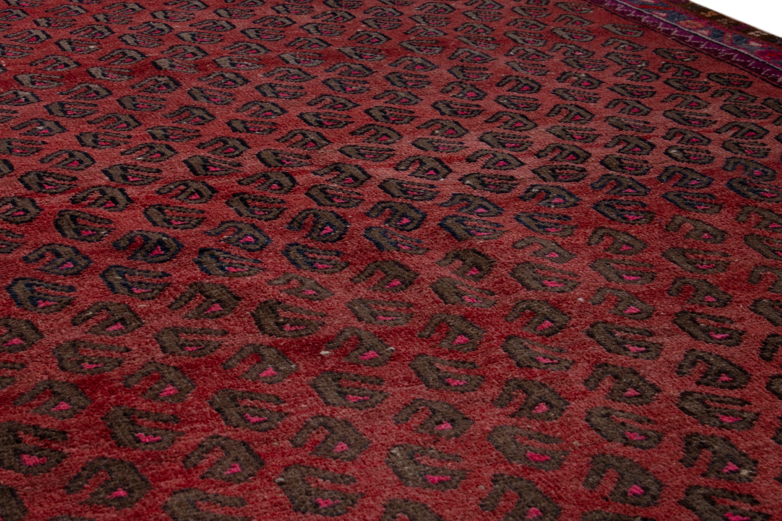 Persian Lori area rug in deep red and burgundy, view 11 of 18