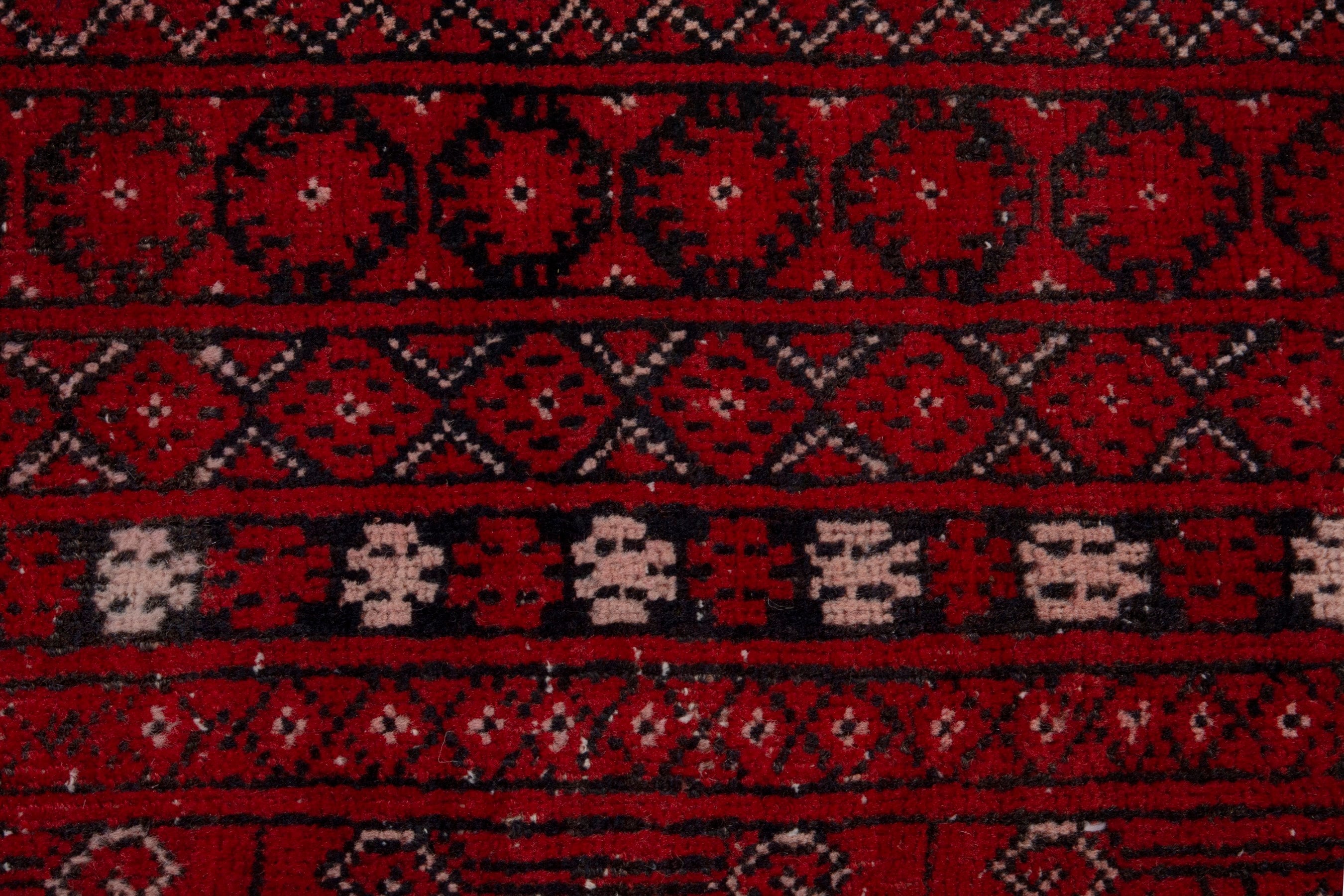 Persian Torkaman area rug in deep red and burgundy, view 13 of 19